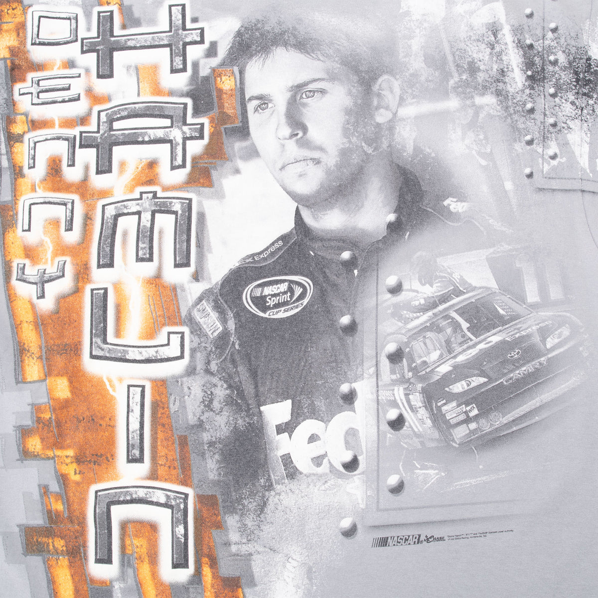 Back graphic detail with Denny Hamlin portrait, vertical lettering, and race car