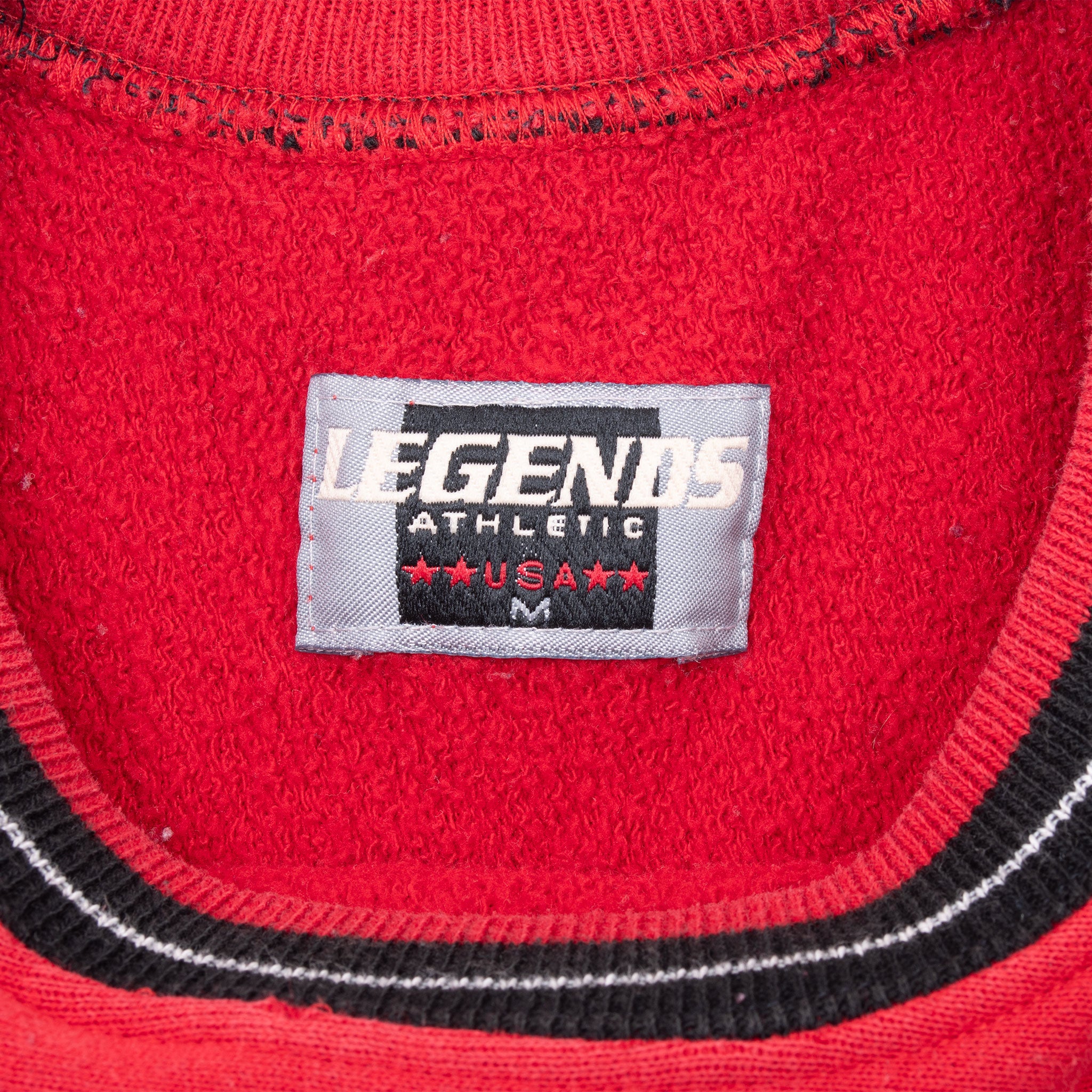 Legends Athletic USA neck label inside red Kansas City Chiefs sweatshirt