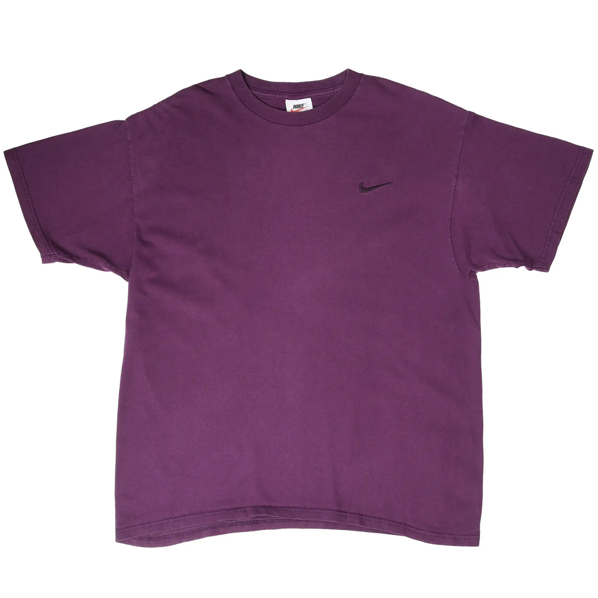 Front of purple Nike T-shirt with small dark Swoosh embroidery