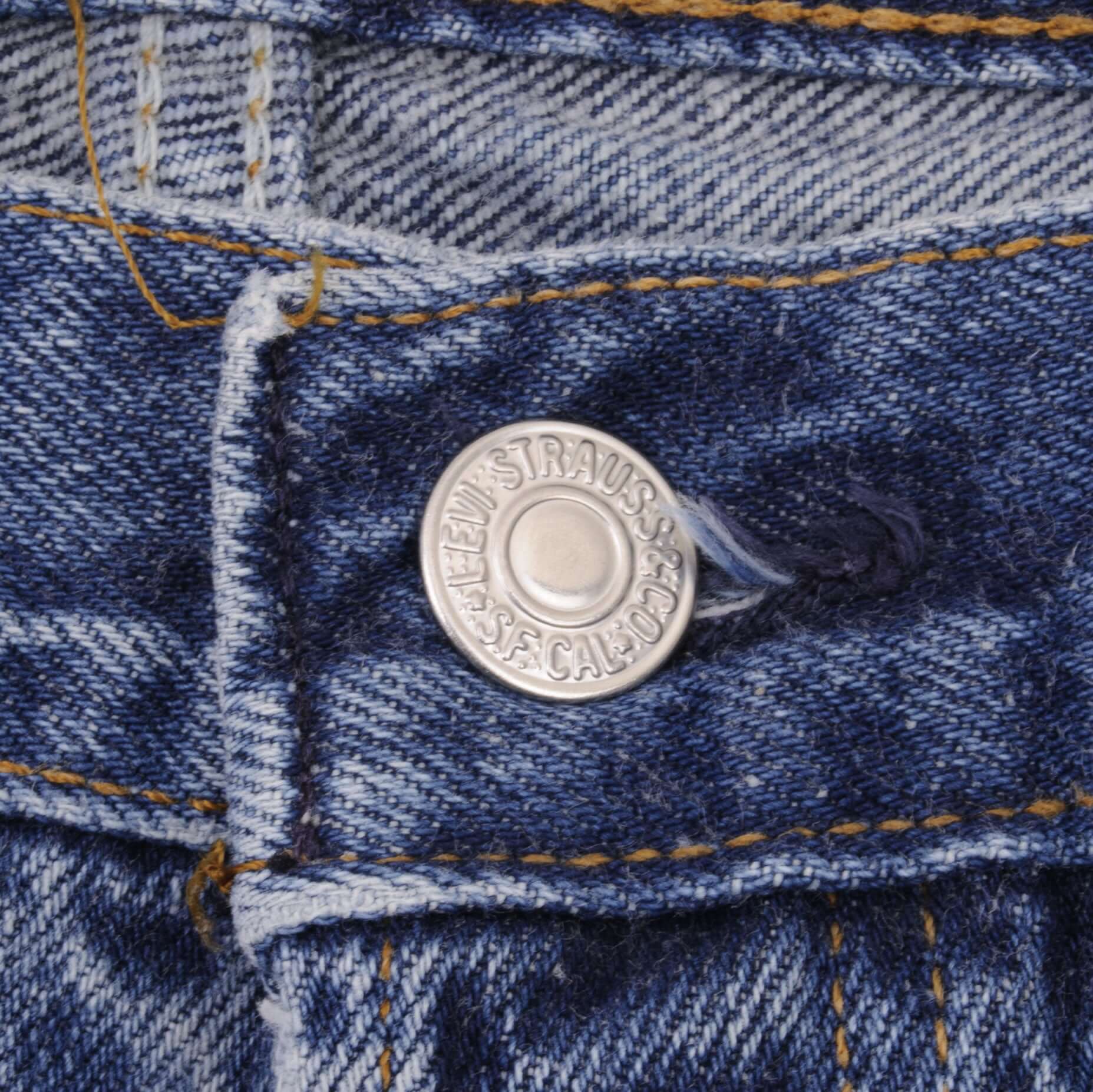 Beautiful Indigo Levis 501 jeans 1980s Made in USA with Medium Wash.  Size on tag 35X32 Actual Size 32X28  Back Button #522