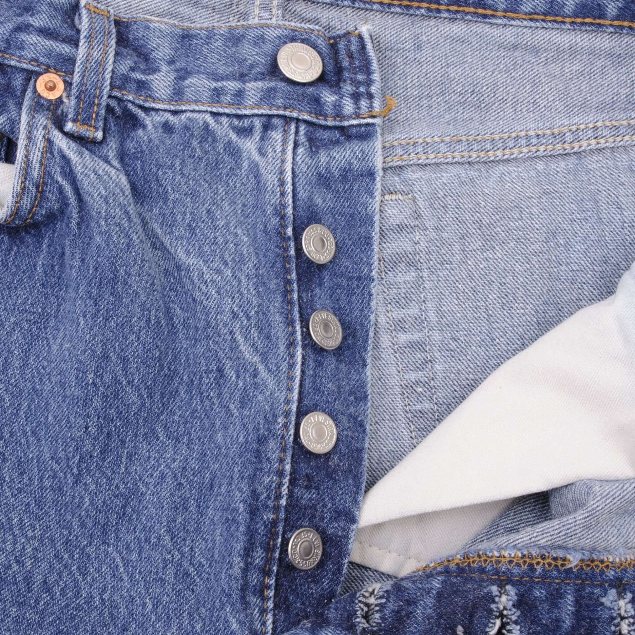 Beautiful Indigo Levis 501 jeans 1980s Made in USA with Medium Wash.  Size on tag 35X32 Actual Size 32X28  Back Button #522