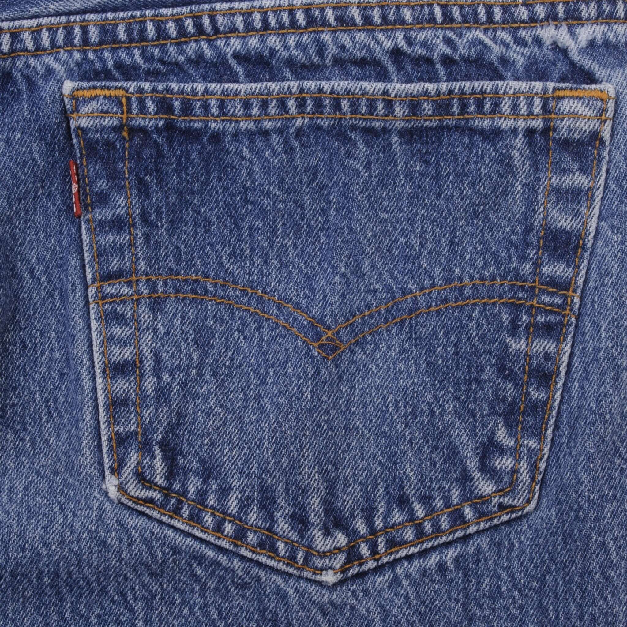 Beautiful Indigo Levis 501 jeans 1980s Made in USA with Medium Wash.  Size on tag 35X32 Actual Size 32X28  Back Button #522