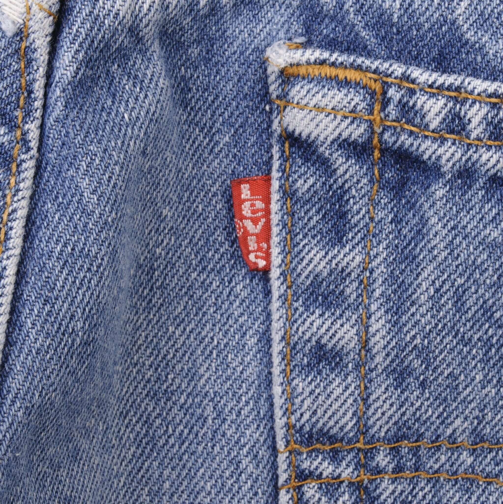 Beautiful Indigo Levis 501 jeans 1980s Made in USA with Medium Light Wash. Size on tag 36X38 Actual Size 35X34 Back Button #552