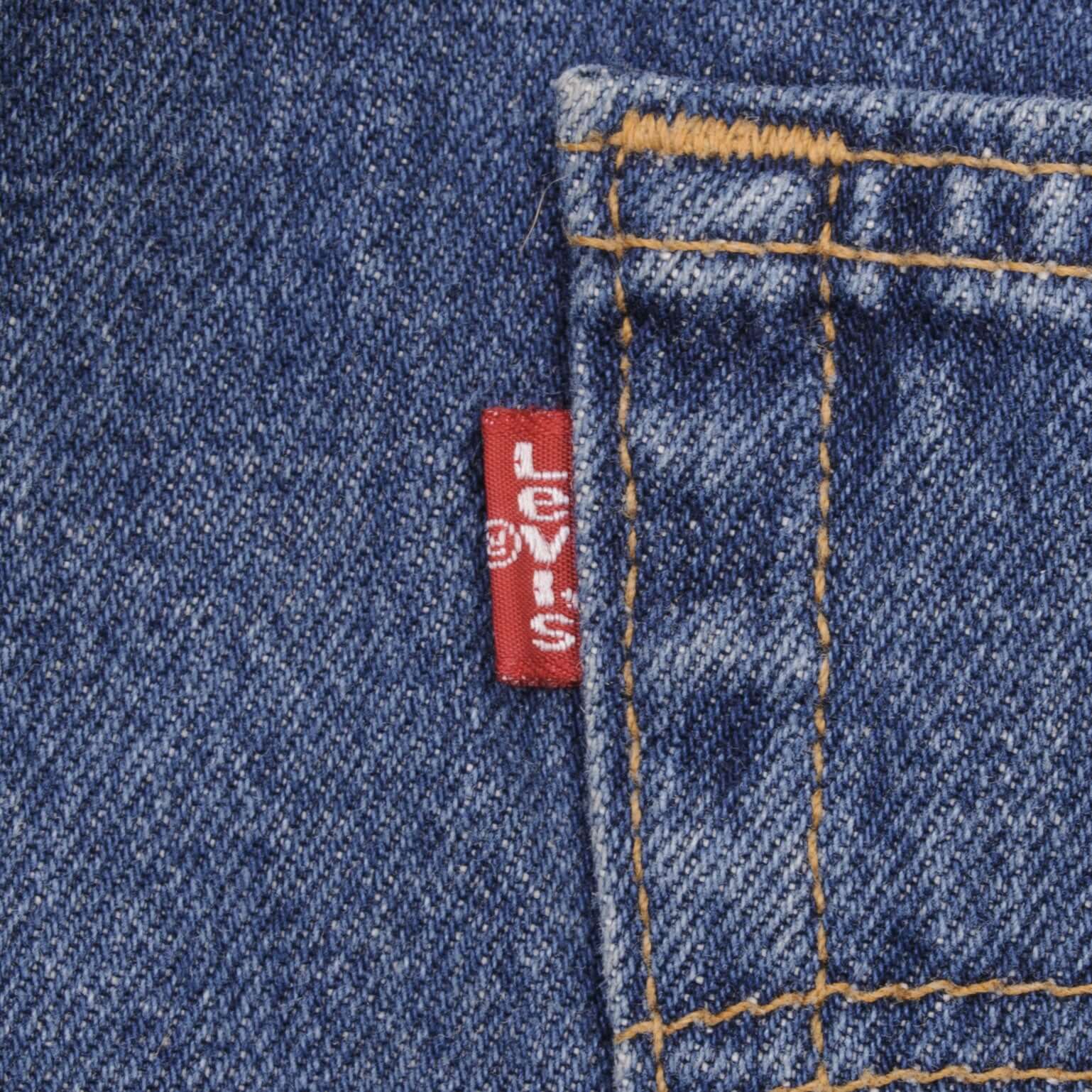 Beautiful Indigo Levis 501 jeans 1990s Made in USA with Medium Dark Wash. Size on tag 36X32 Actual Size 35X31 Back Button #511