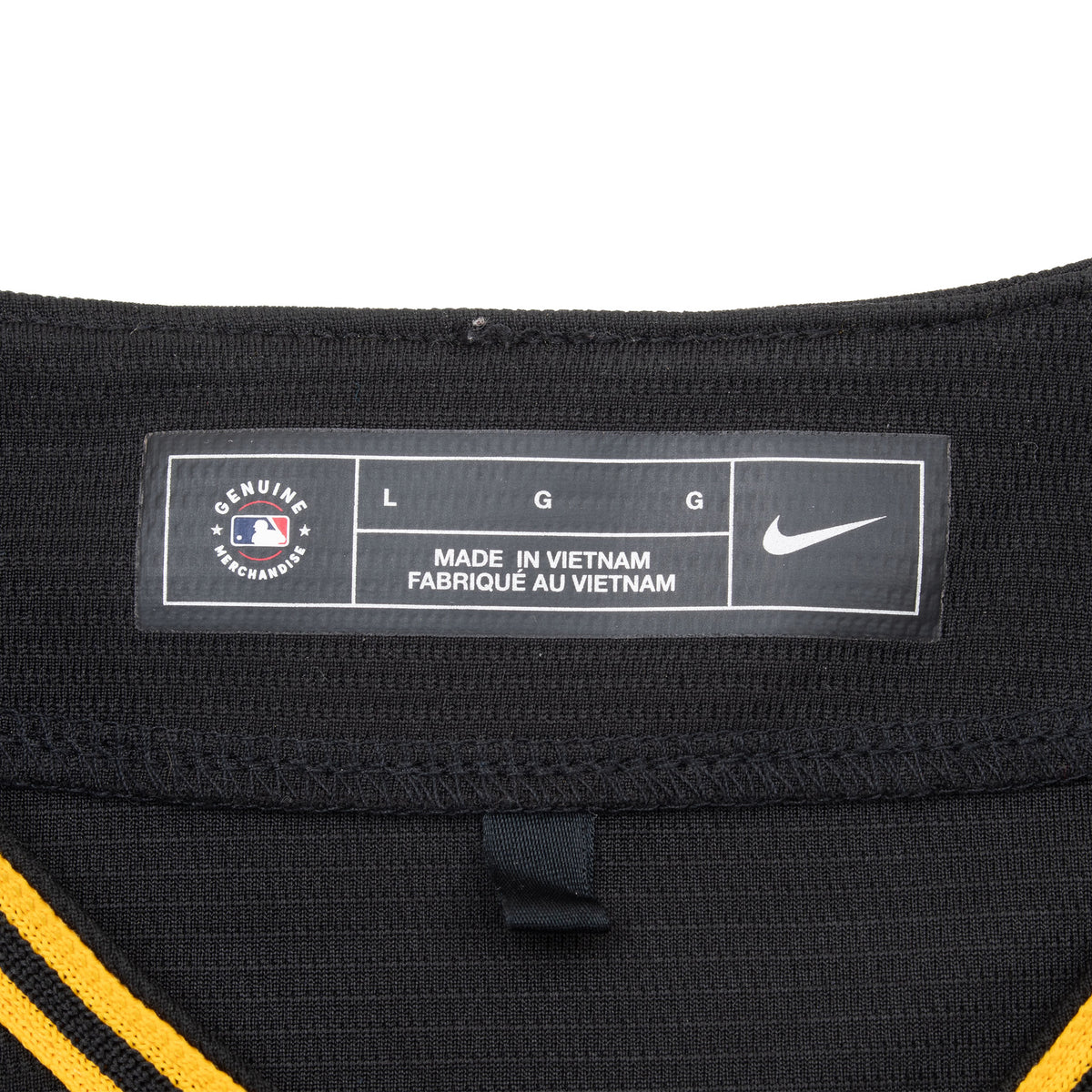 Nike MLB neck label showing size large inside black Pittsburgh Pirates jersey