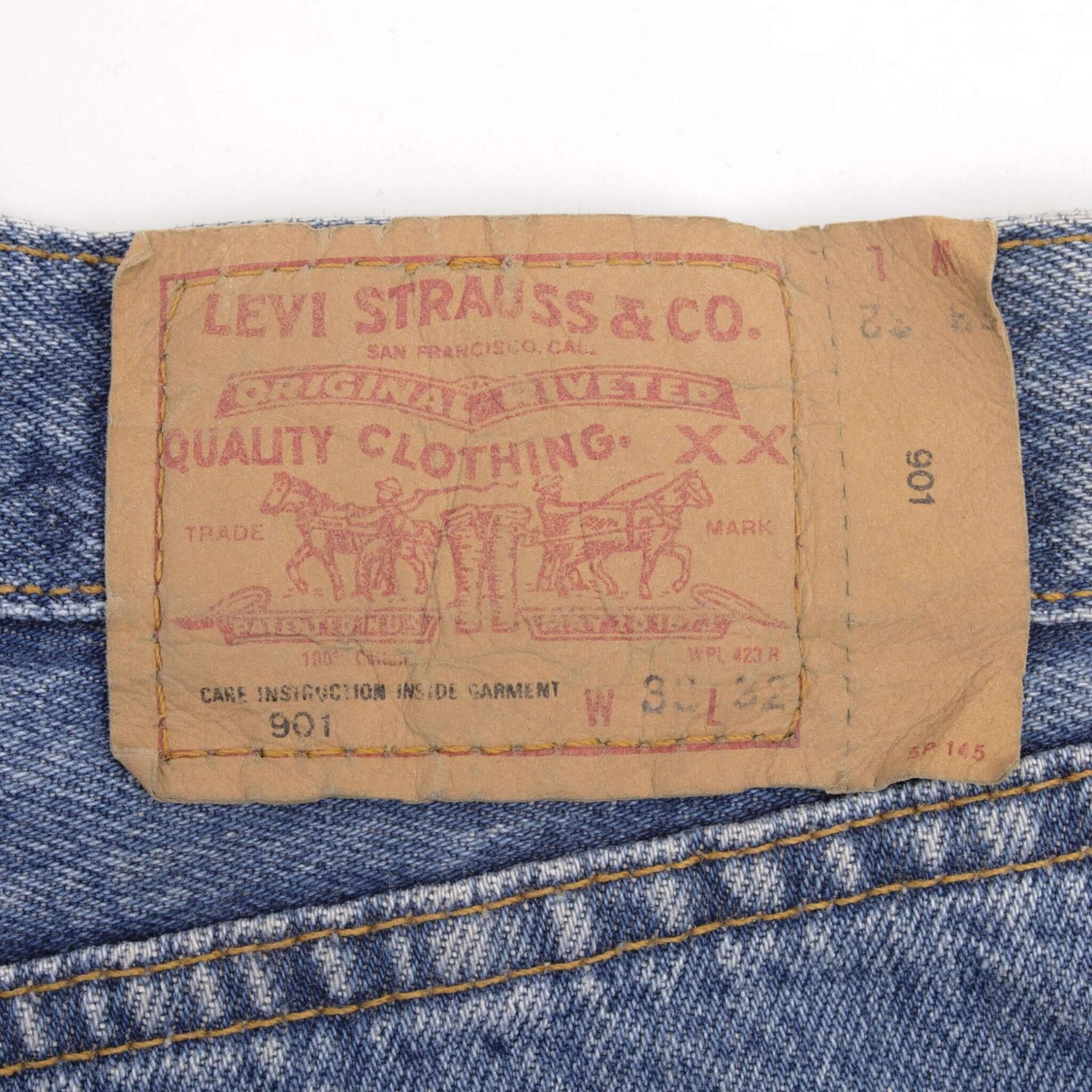 Beautiful Indigo Levis 501 Woman High Waist Also Called 901 Jeans 1990s Made in France with Medium Wash Preshrunk Deadstock Size on tag 30X32 Back Button #275