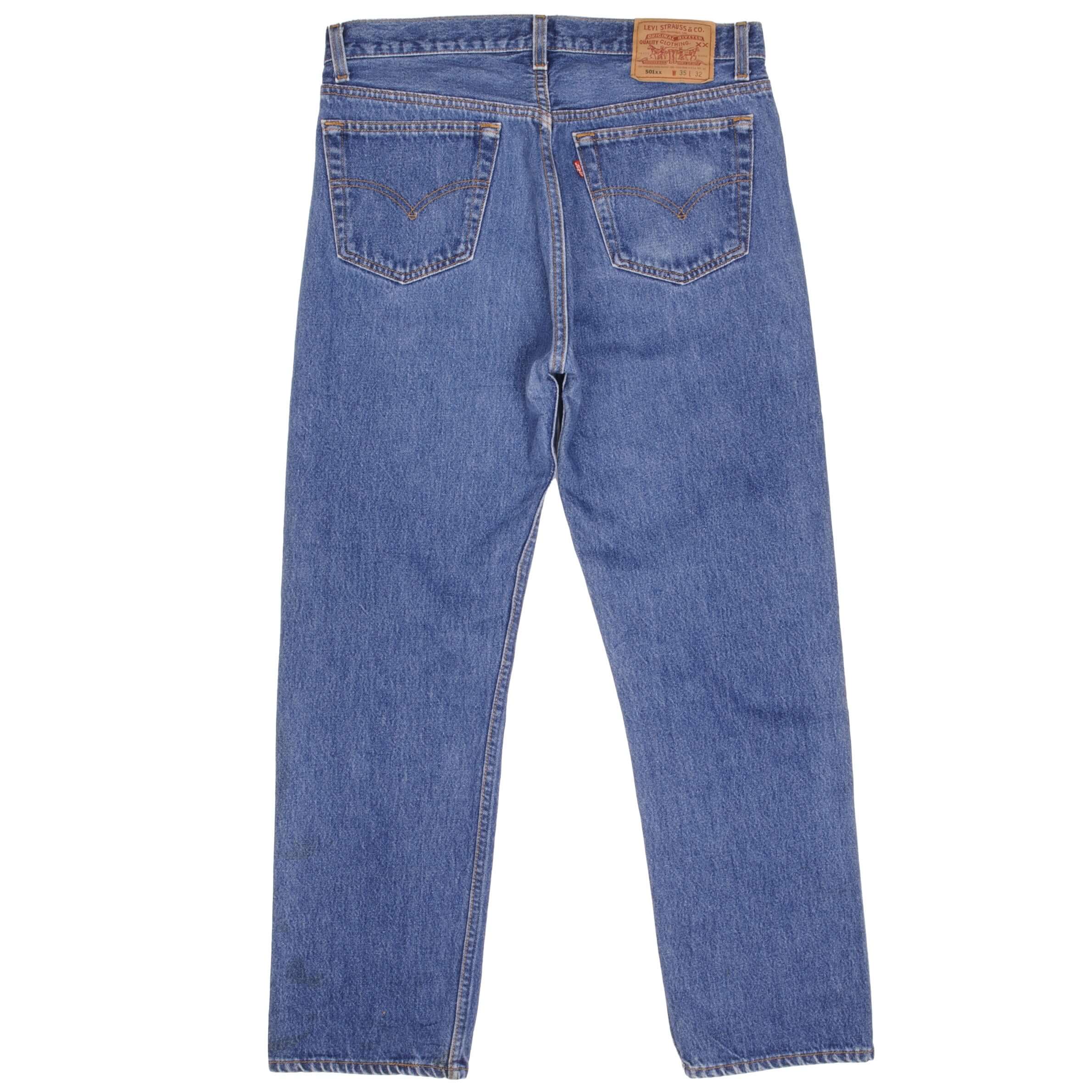 Beautiful Indigo Levis 501 Jeans 1990s Made in USA with Medium Dark Wash Size on tag 35X32 Actual Size 34X29 Back Button #552