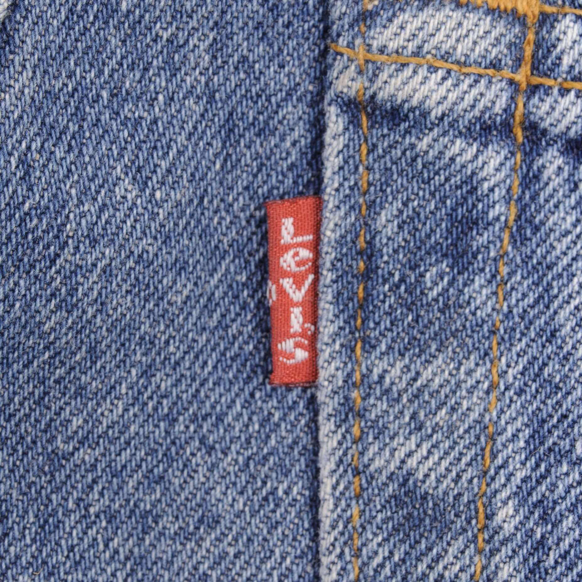 Beautiful Indigo Levis 501 Woman High Waist Also Called 901 Jeans 1990s Made in France with Medium Wash Preshrunk Deadstock Size on tag 30X32 Back Button #275