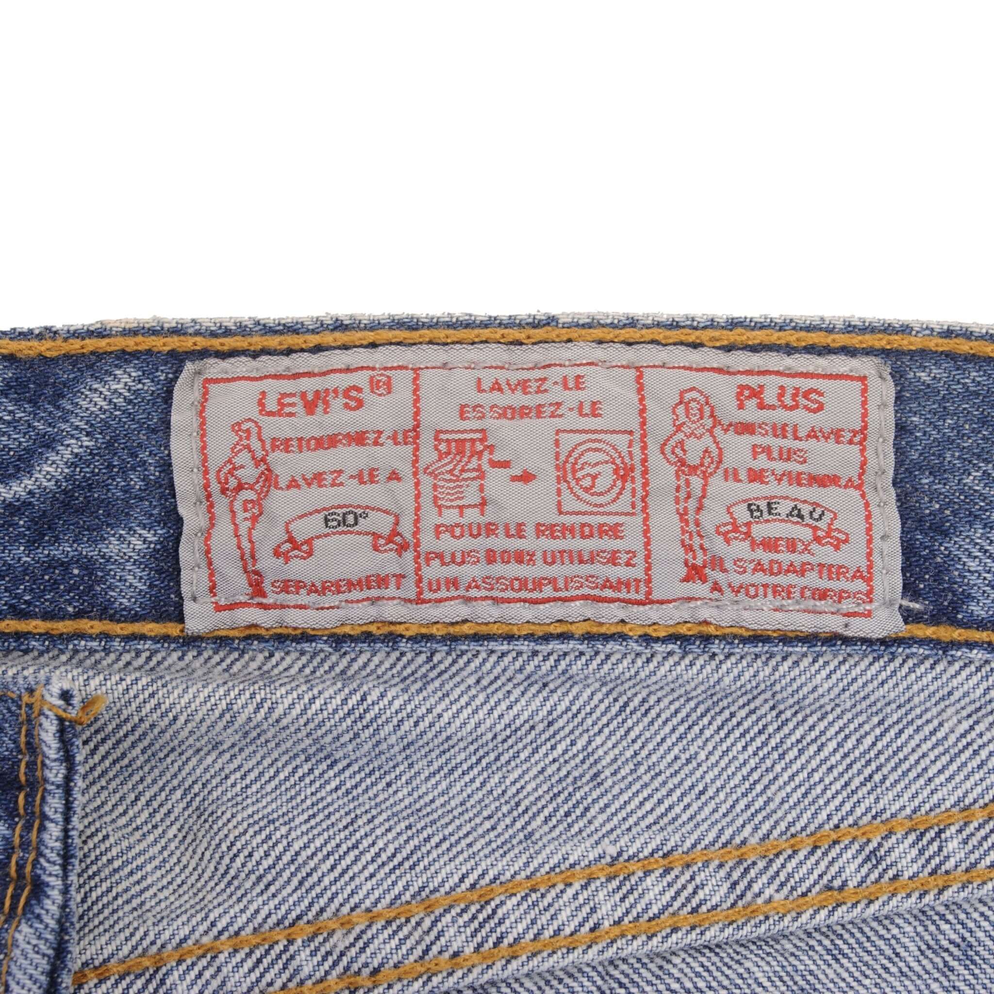 Beautiful Indigo Levis 501 Woman High Waist Also Called 901 Jeans 1980s Made in France with Medium Wash Preshrunk Deadstock With Tags Size on tag 33X34 Actual Size 30X33 Back Button #275