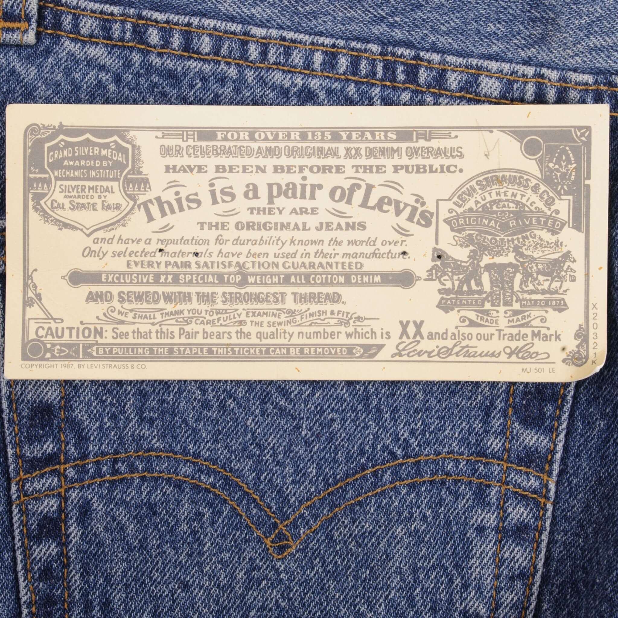 Beautiful Indigo Levis 501 Woman High Waist Also Called 901 Jeans 1980s Made in France with Medium Wash Preshrunk Deadstock With Tags Size on tag 33X34 Actual Size 30X33 Back Button #275