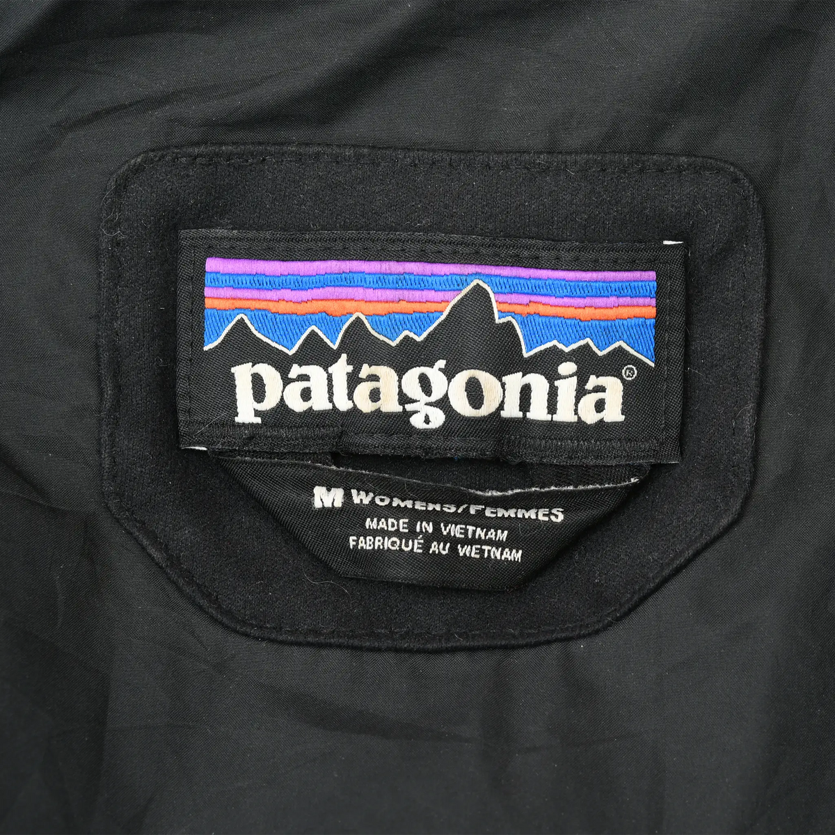 Patagonia neck label with women's medium size marking