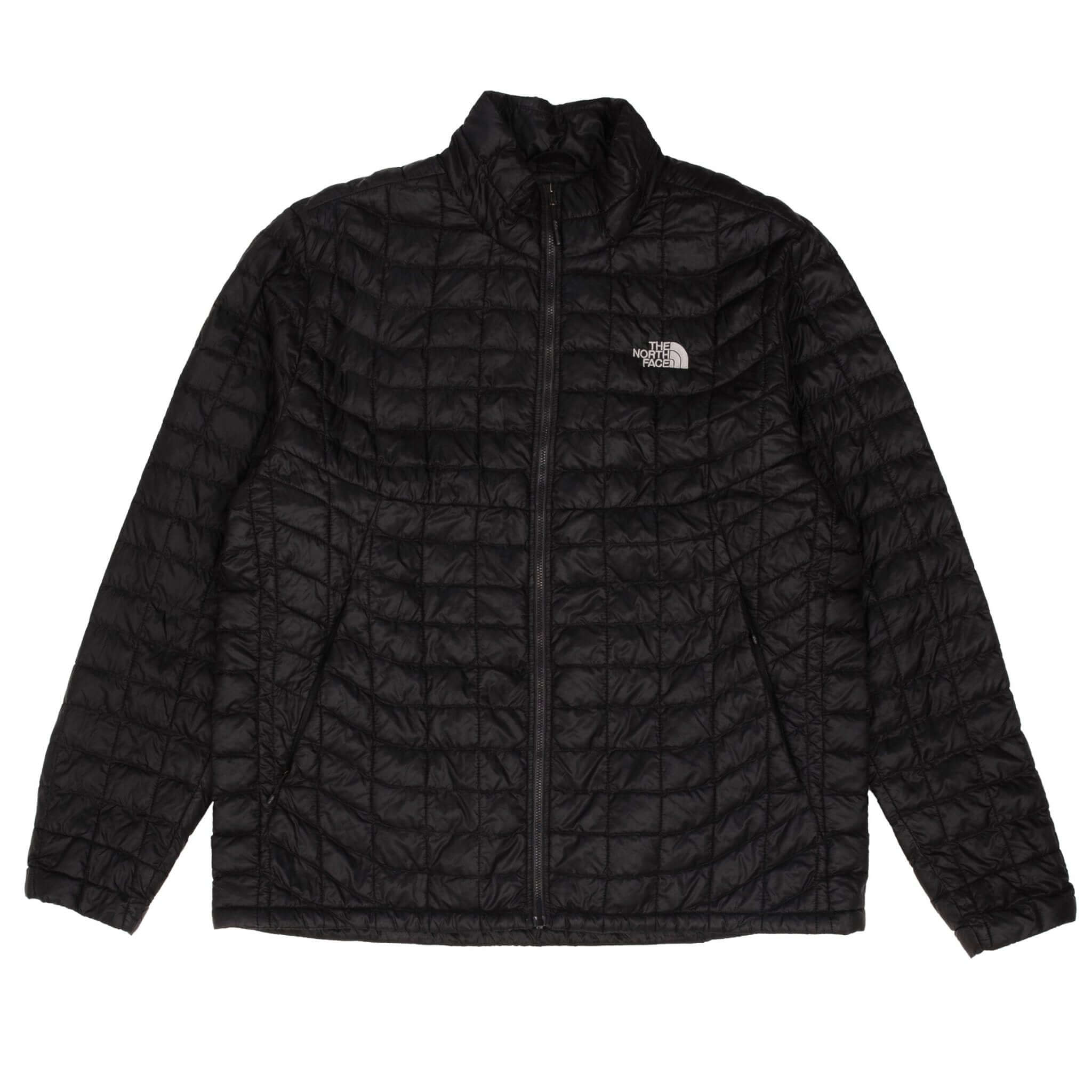 Full front view of black The North Face quilted puffer jacket