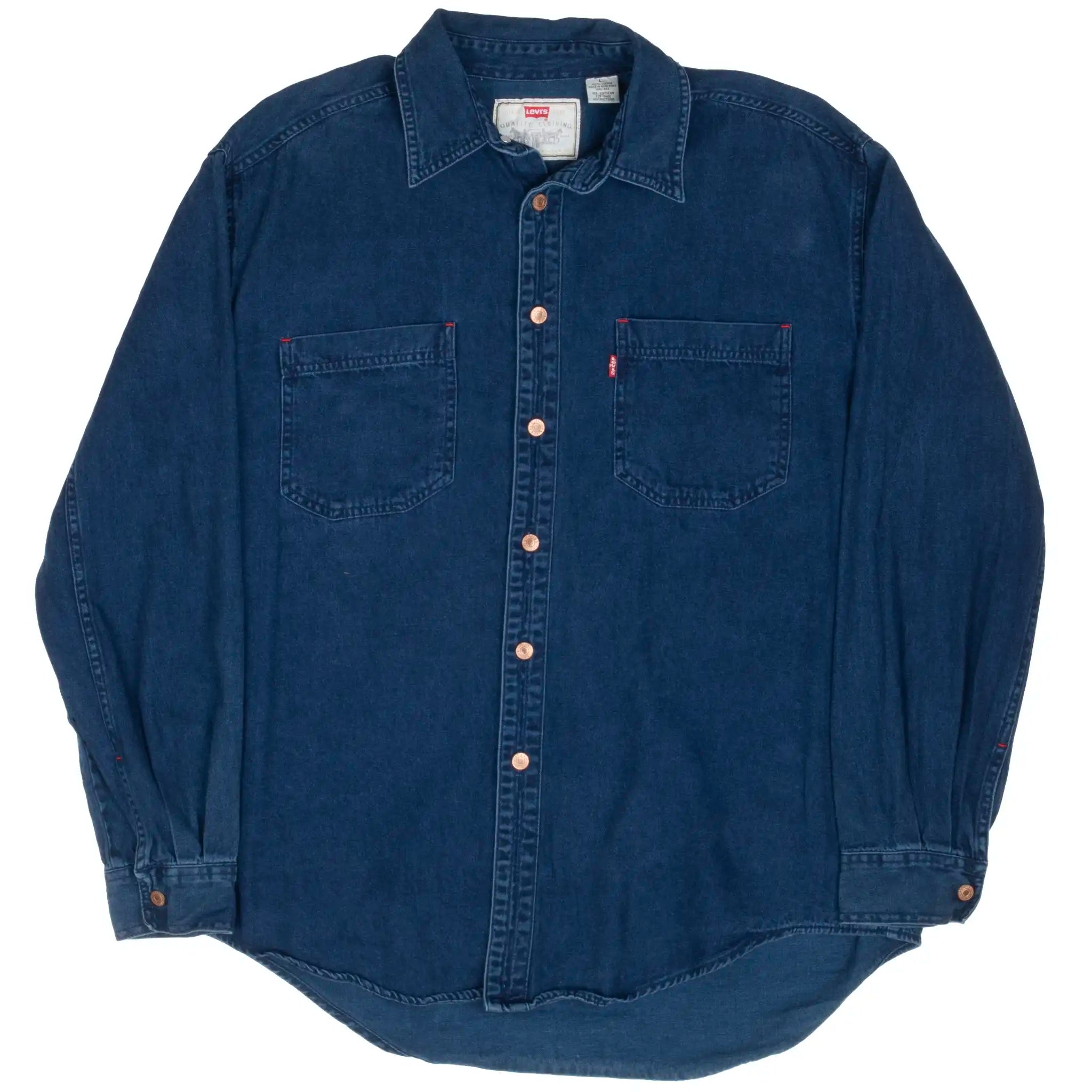 Full front view of Levi's blue denim shirt with long sleeves and chest pockets