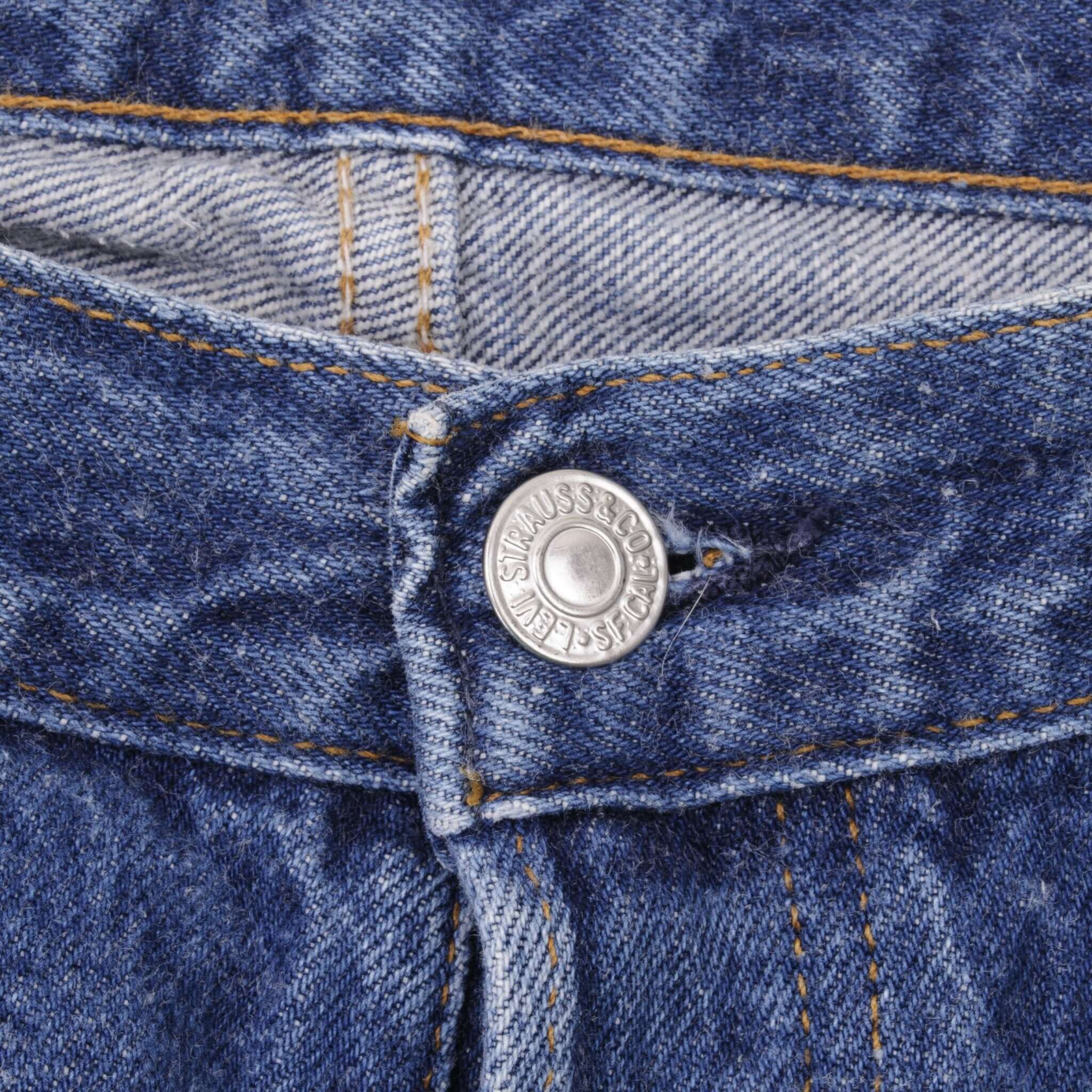 Beautiful Indigo Levis 501 Jeans 1980s Made in USA with Medium Wash. Size on tag 35X30 Actual Size 33X29 Back Button #553