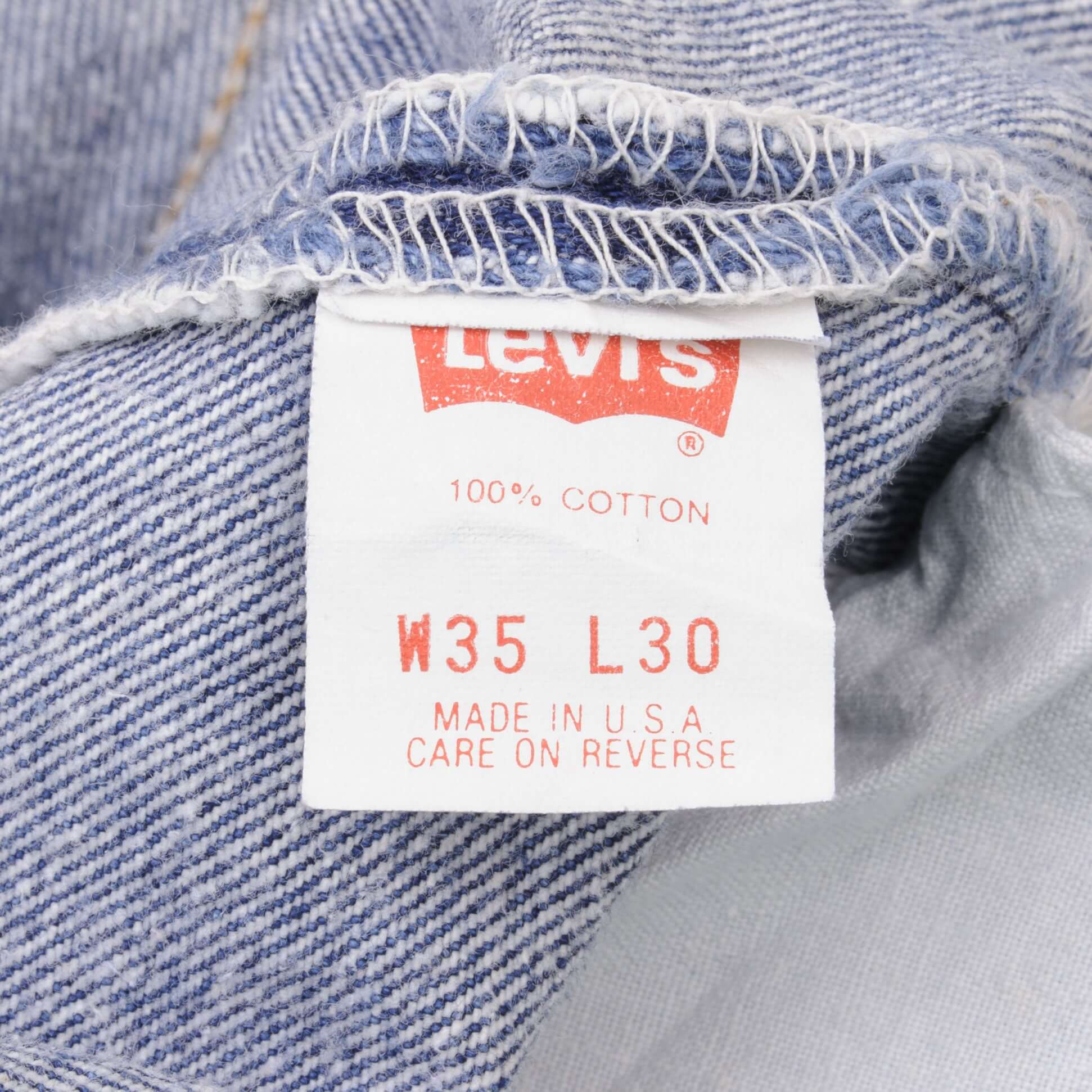 Beautiful Indigo Levis 501 Jeans 1980s Made in USA with Medium Wash. Size on tag 35X30 Actual Size 33X29 Back Button #553