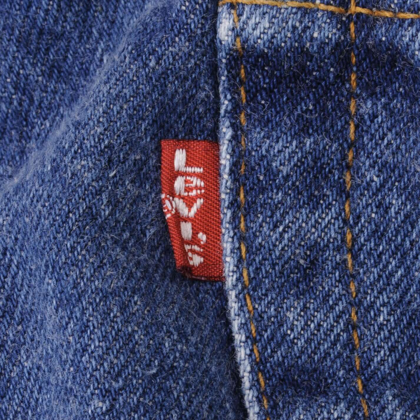 Beautiful Indigo Levis 501 Jeans 1980s Made in USA with Medium Wash. Size on tag 35X30 Actual Size 33X29 Back Button #553