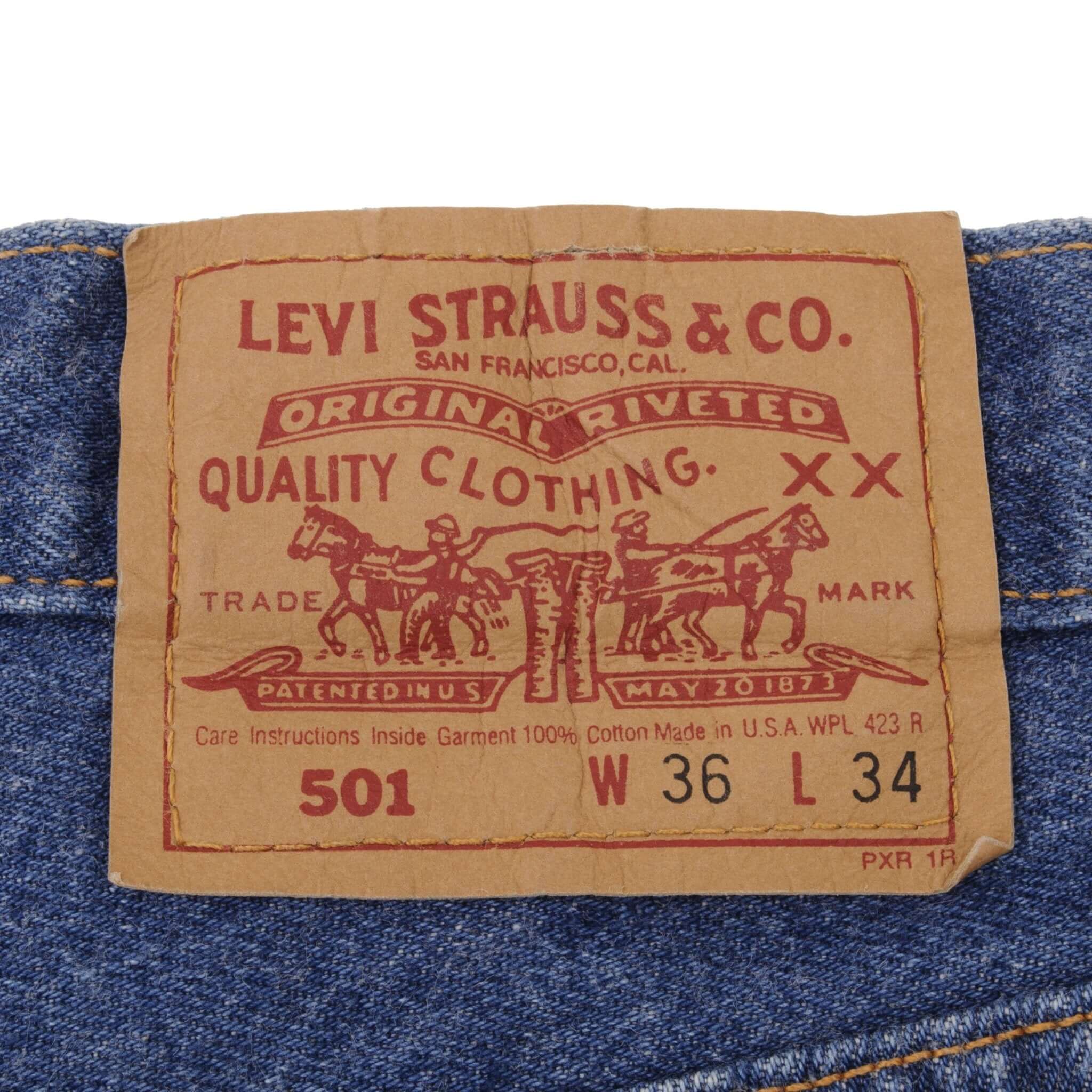 Beautiful Indigo Levis 501 Jeans 1980s Made in USA with Medium Dark Wash. Size on tag 36X34 Actual Size 35X34 Back Button #522