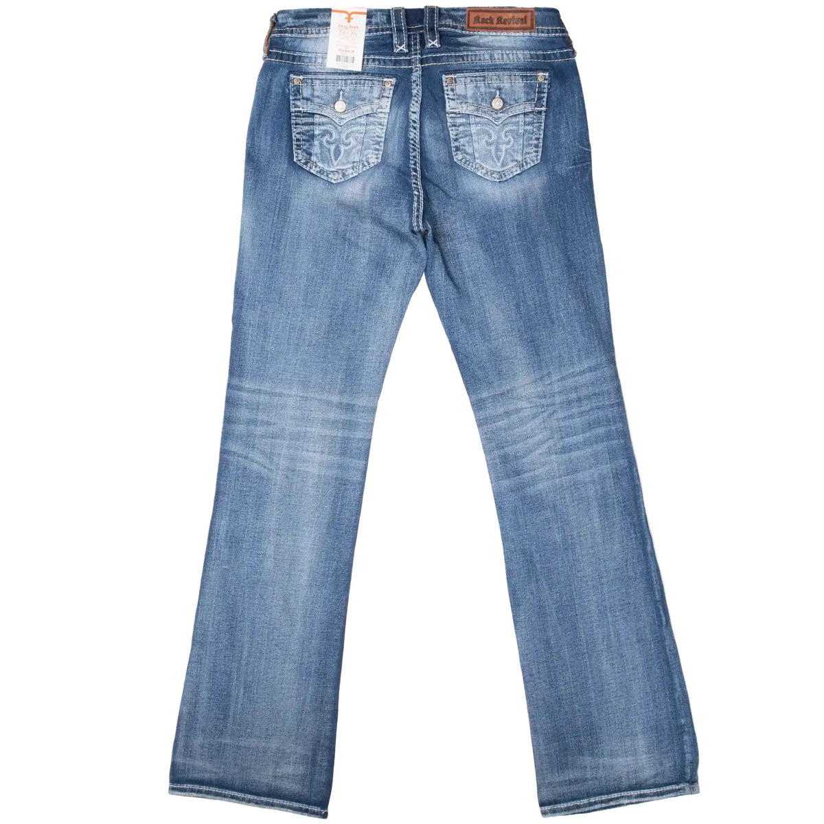 Back of Rock Revival blue denim jeans with embroidered flap pockets and faded wash