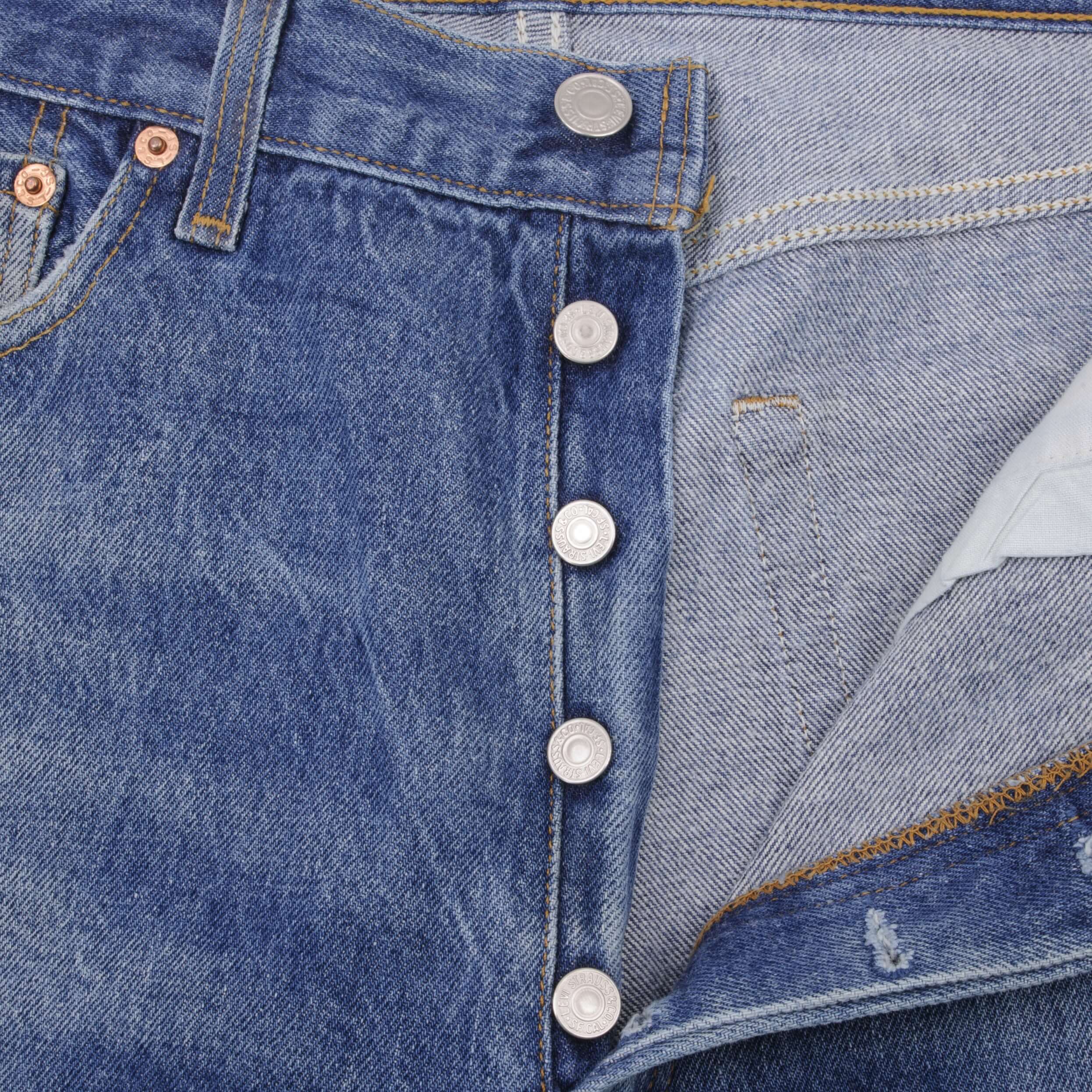 Beautiful Indigo Levis 501 Jeans 1980s Made in USA with Medium Light Wash. Size on tag 35X30 Actual Size 34X28 Back Button #653