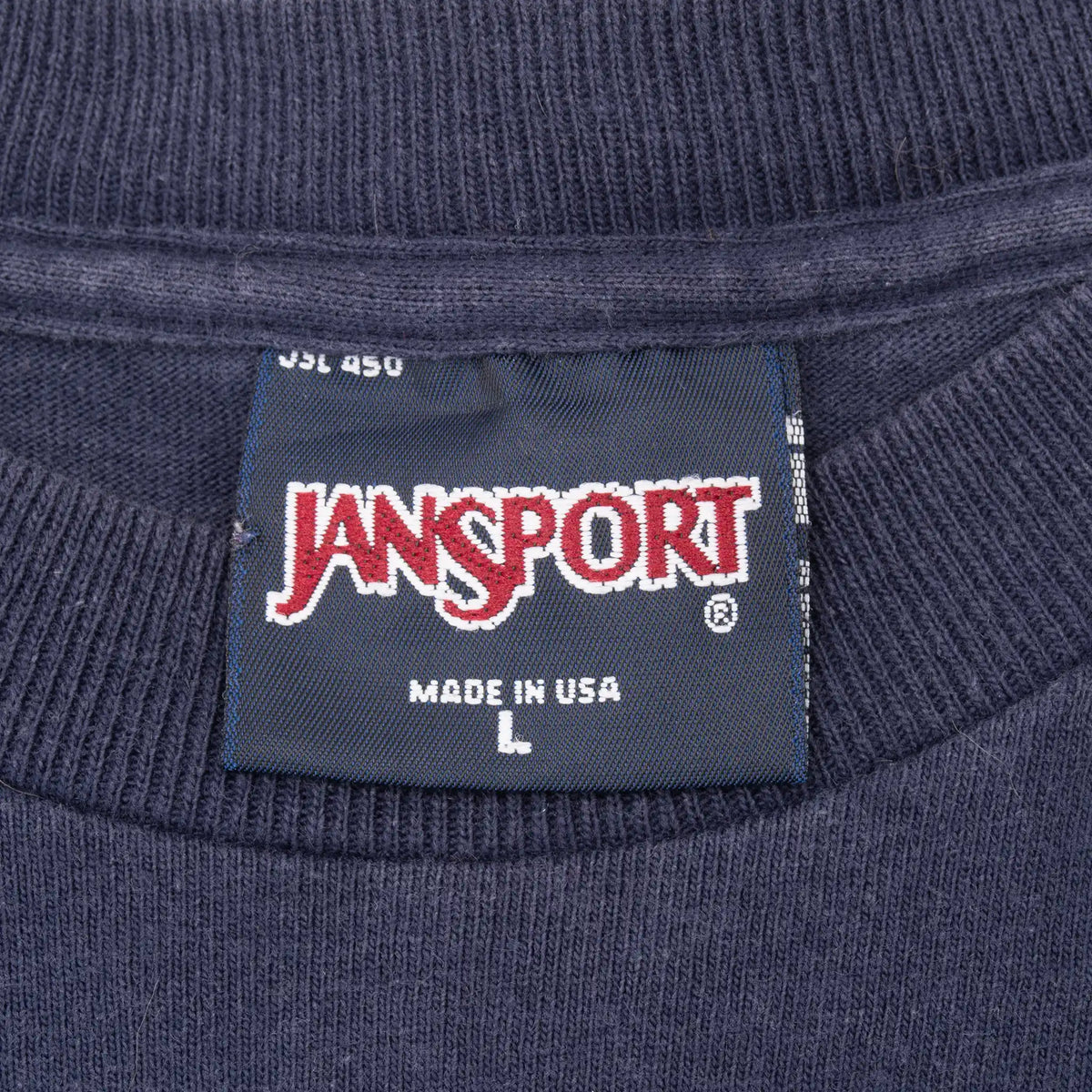 Jansport neck label marked Made in USA and size large