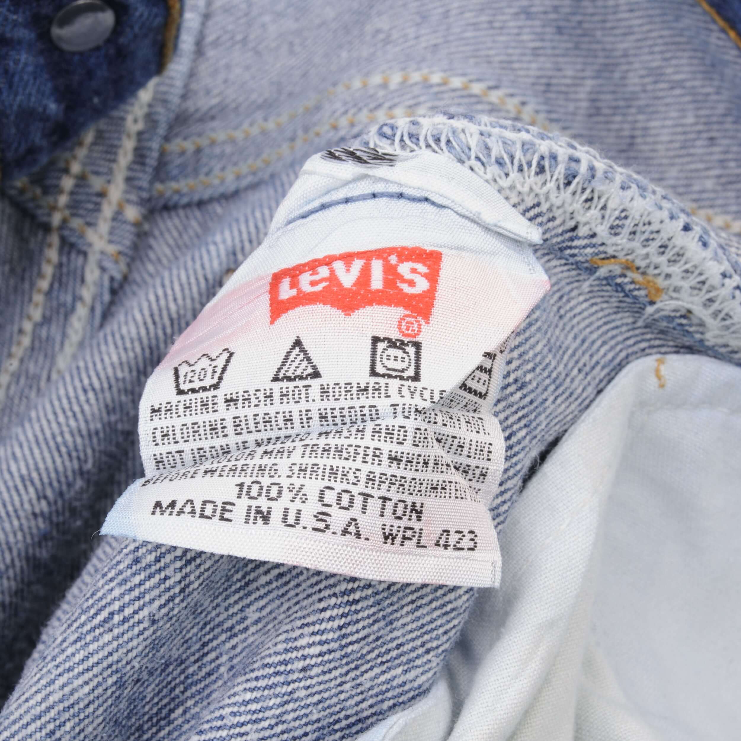 Beautiful Indigo Levis 501 Jeans 1980s Made in USA with Medium Light Wash. Size on tag 35X30 Actual Size 34X28 Back Button #653