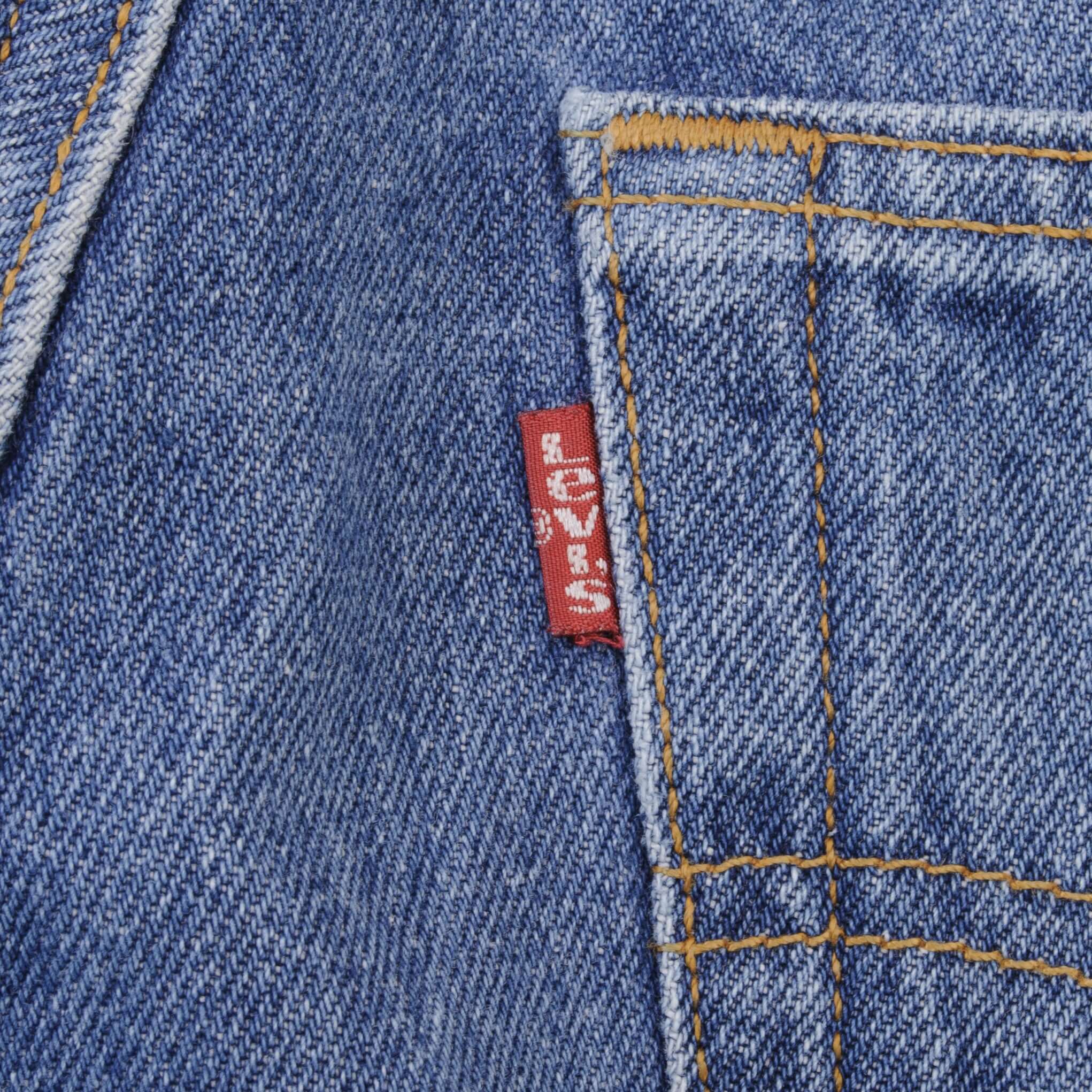 Beautiful Indigo Levis 501 Jeans 1980s Made in USA with Medium Light Wash. Size on tag 35X30 Actual Size 34X28 Back Button #653