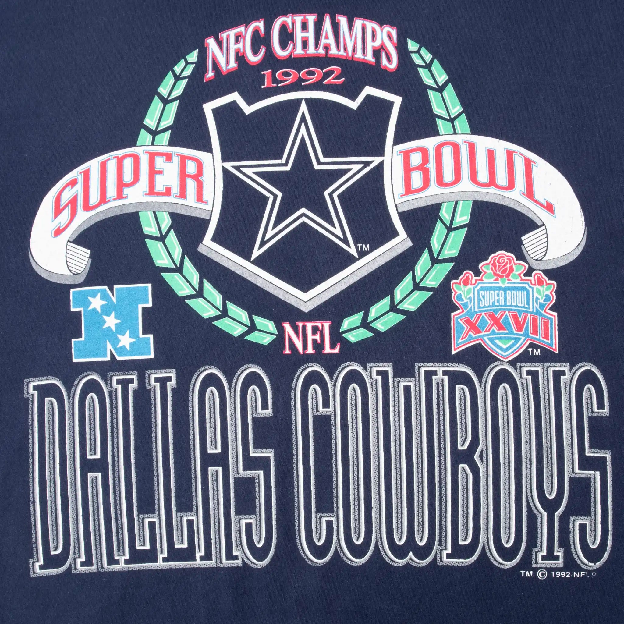 Close-up of Dallas Cowboys 1992 NFC Champions and Super Bowl XXVII front graphic