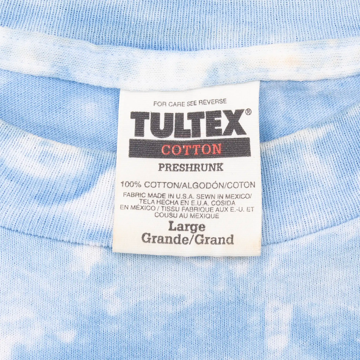 Tultex Large neck label on the blue tie-dye T-shirt