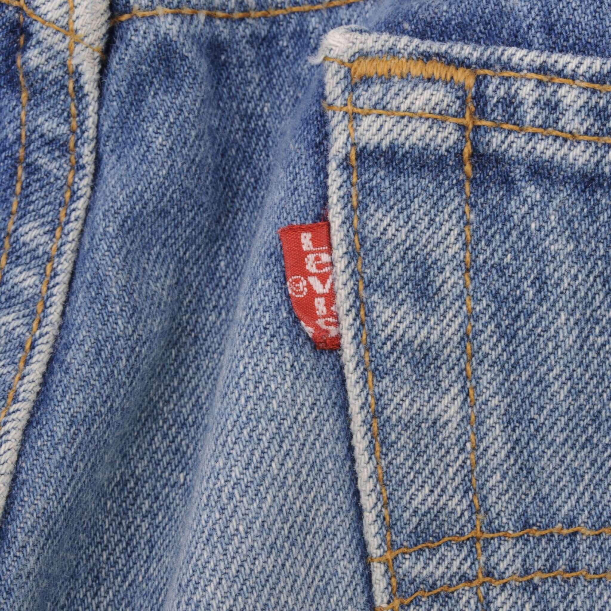 Beautiful Indigo Levis 501 Jeans 1980s Made in USA with Medium Light Wash. Size on tag 36X38 Actual Size 36X35 Back Button #552