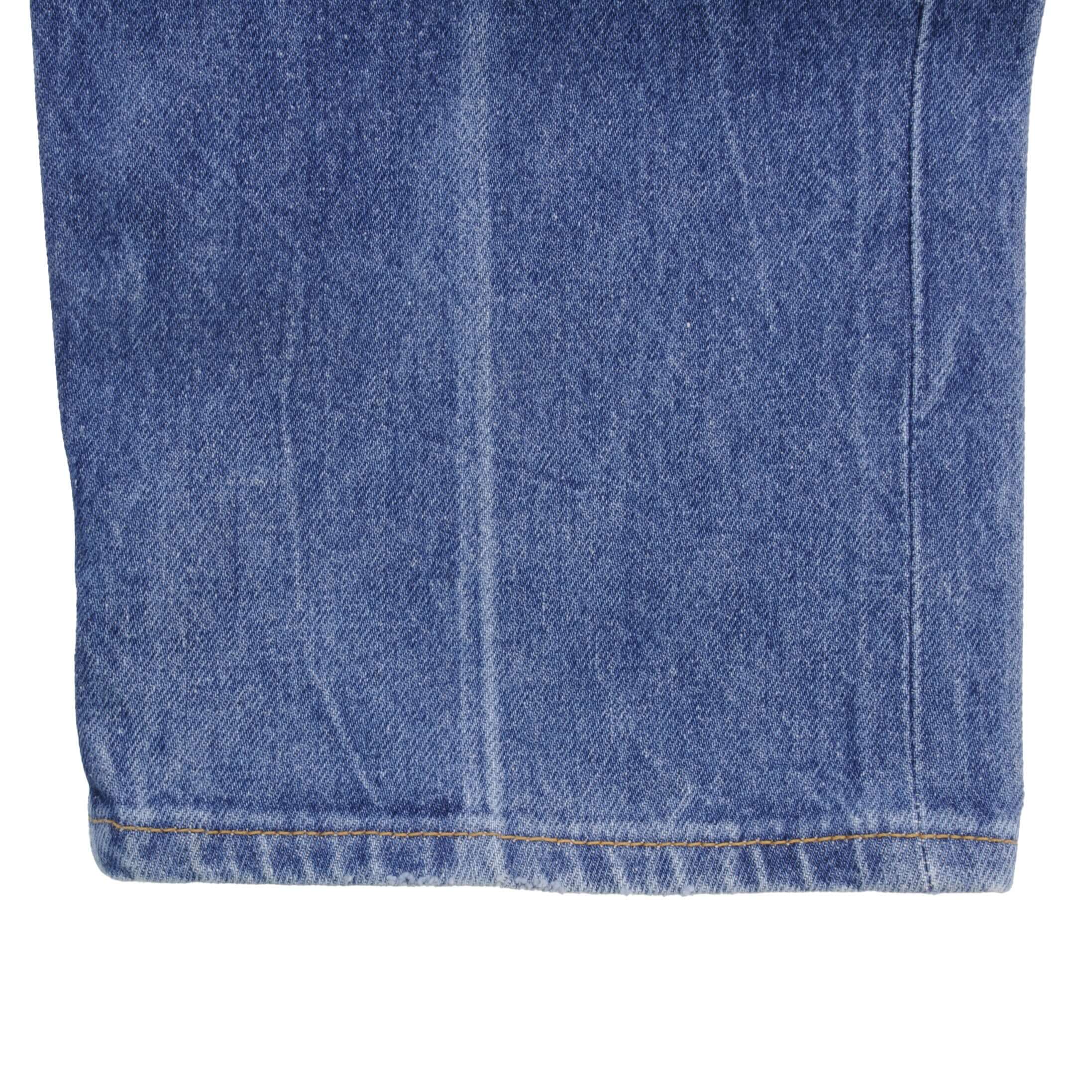 Beautiful Indigo Levis 501 Jeans 1980s Made in USA with Medium Light Wash. Size on tag 35X30 Actual Size 34X28 Back Button #653