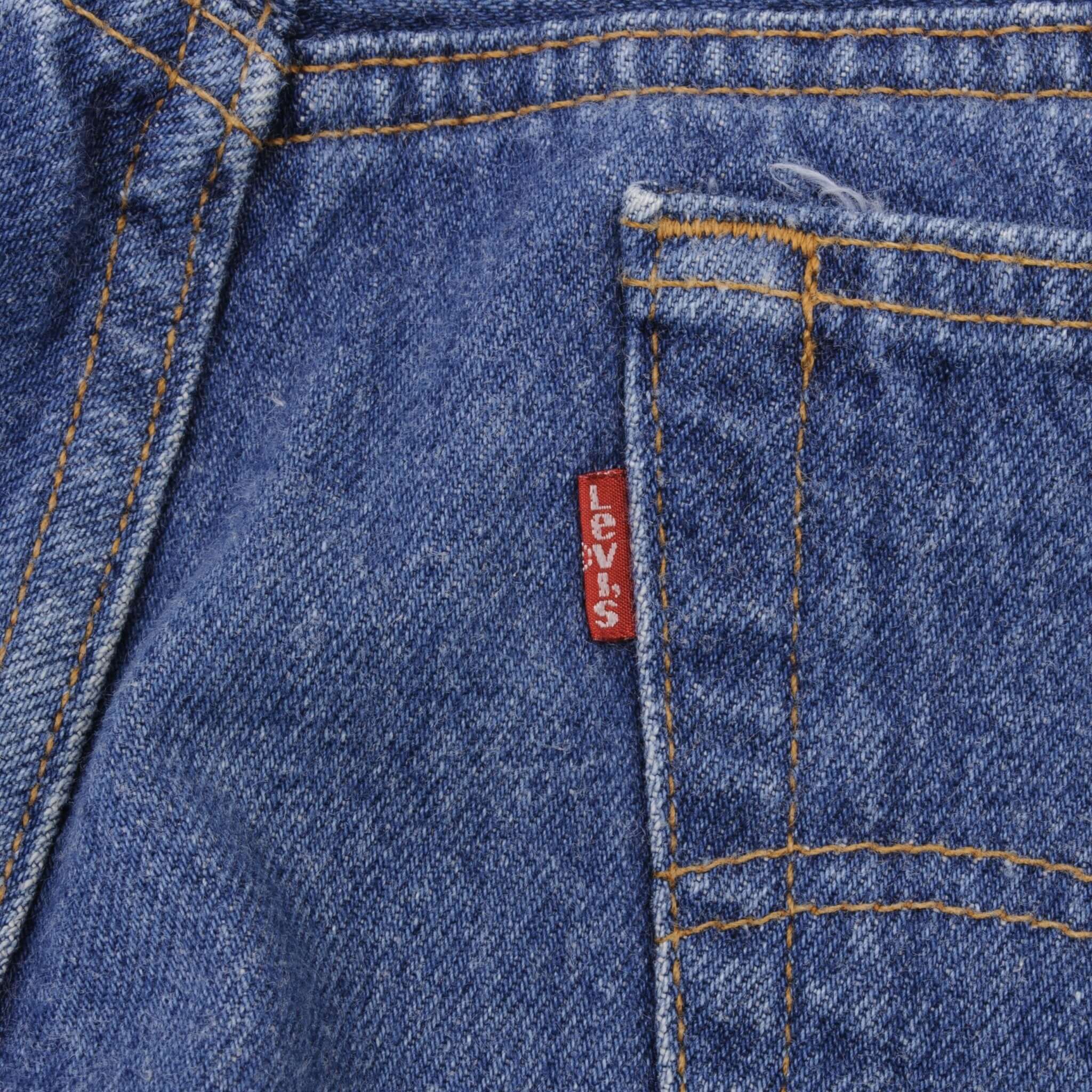 Beautiful Indigo Levis 501 Jeans 1980s Made in USA with Medium Light Wash. Size on tag 35X32 Actual Size 34X30 Back Button #552