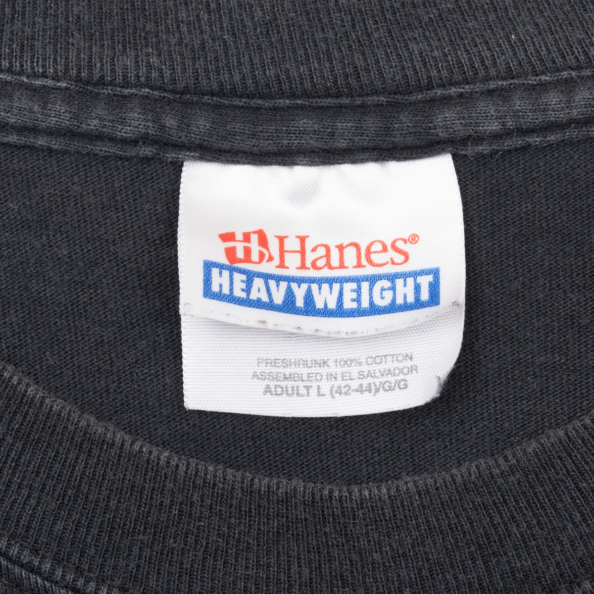 Hanes Heavyweight size large neck tag on black T-shirt