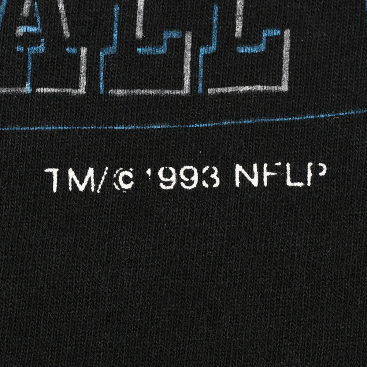 Close-up of 1993 NFL copyright text beneath the front graphic
