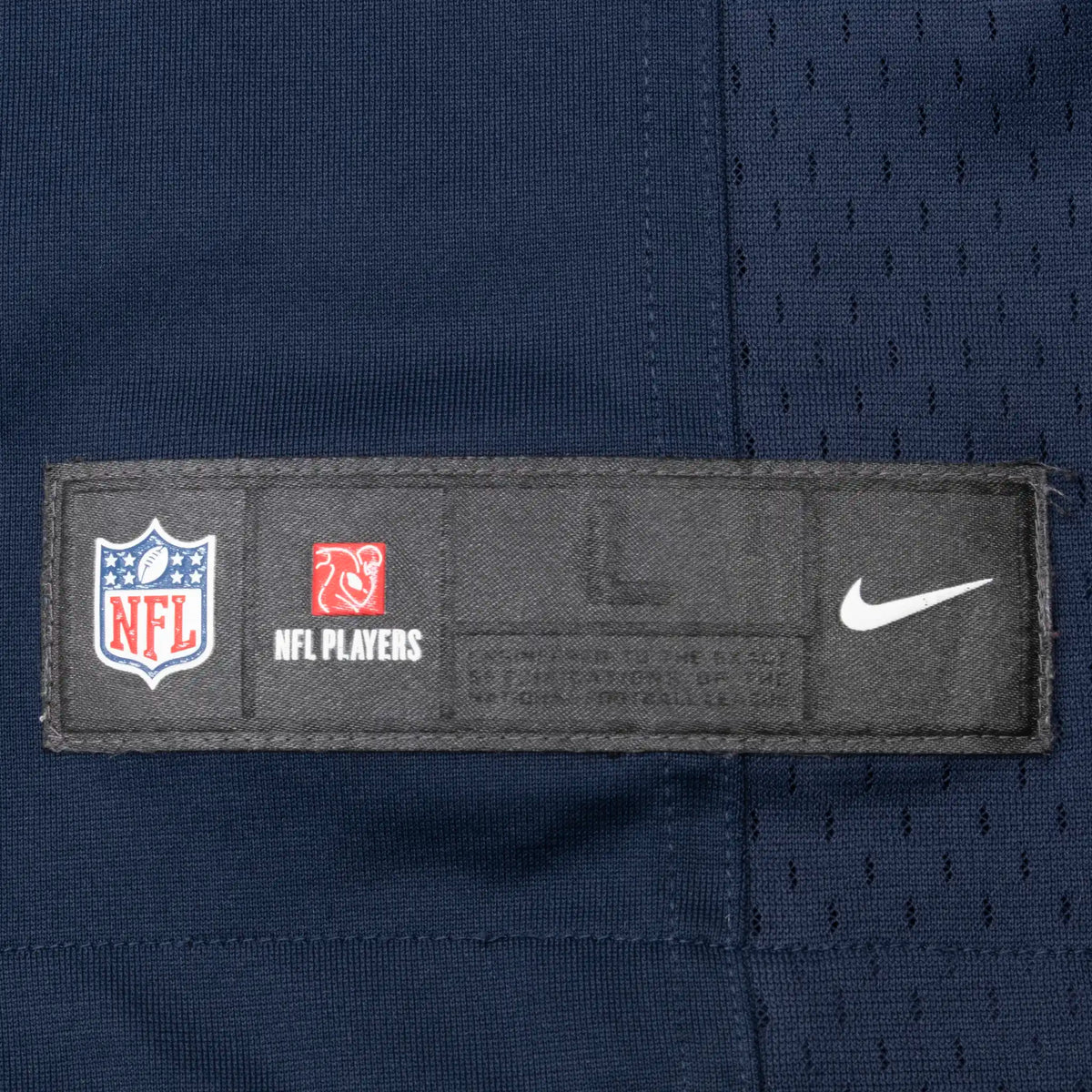 Nike NFL and NFL Players hem label on navy Seahawks jersey