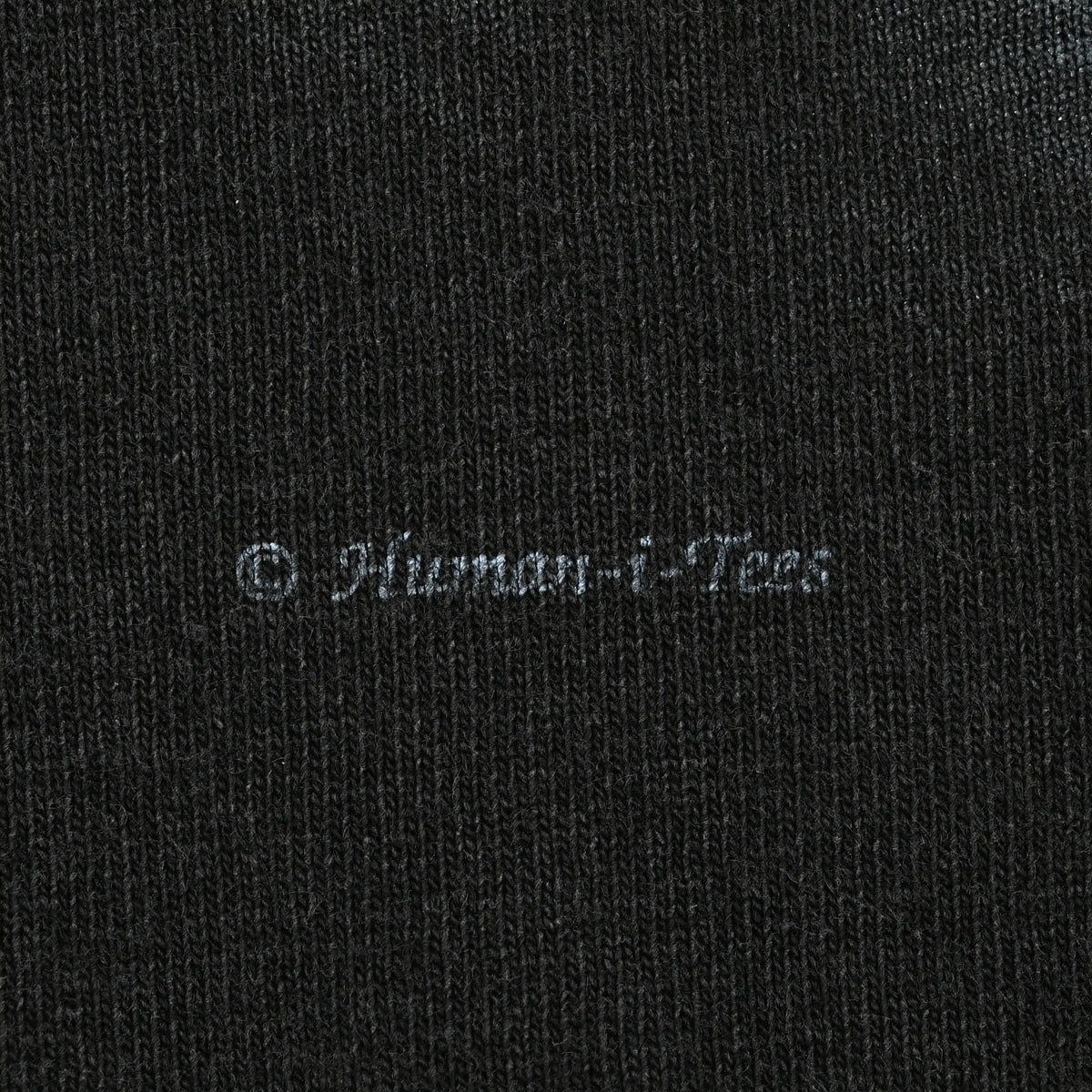 Close-up of small copyright text printed beneath the panther graphic