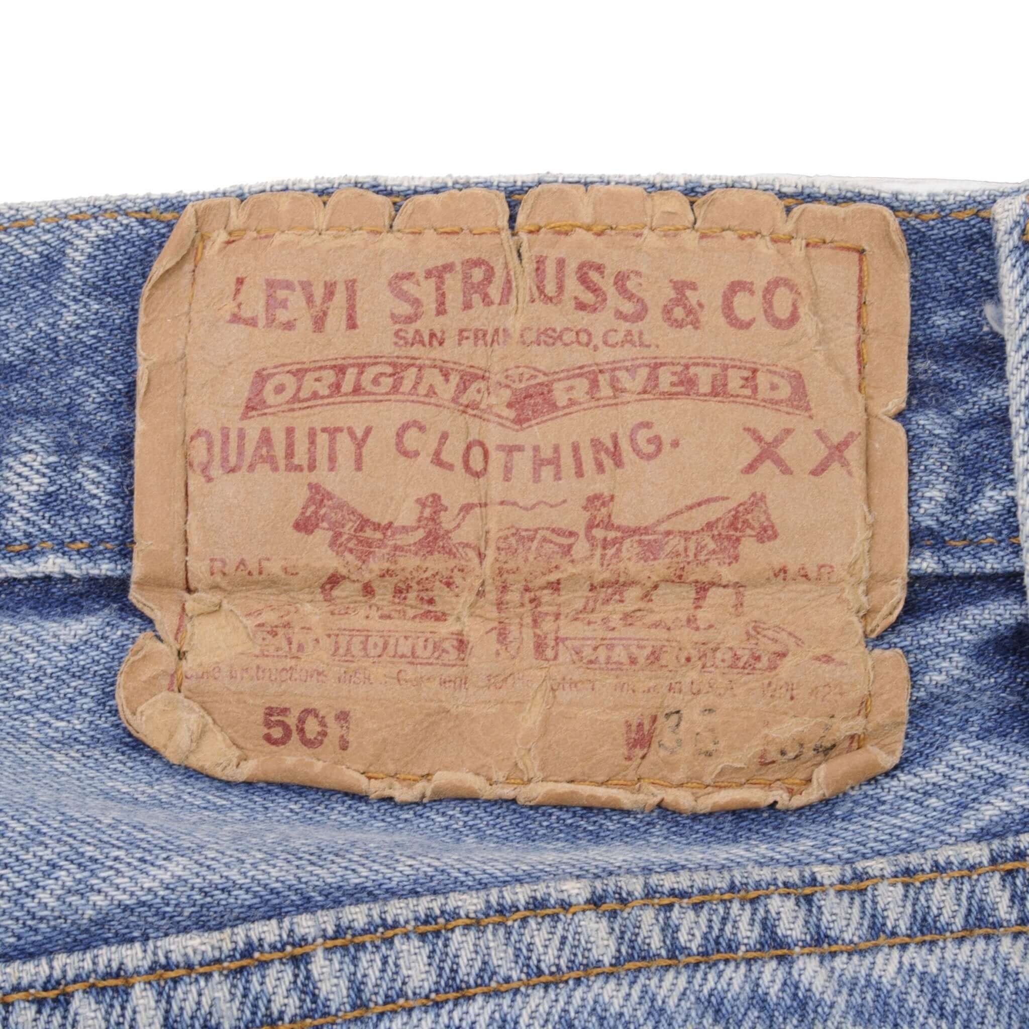 Beautiful Indigo Levis 501 Jeans 1980s Made in USA with Light Wash With Light Whiskers Size on tag 36X34 Actual Size 35X33 Back Button #553