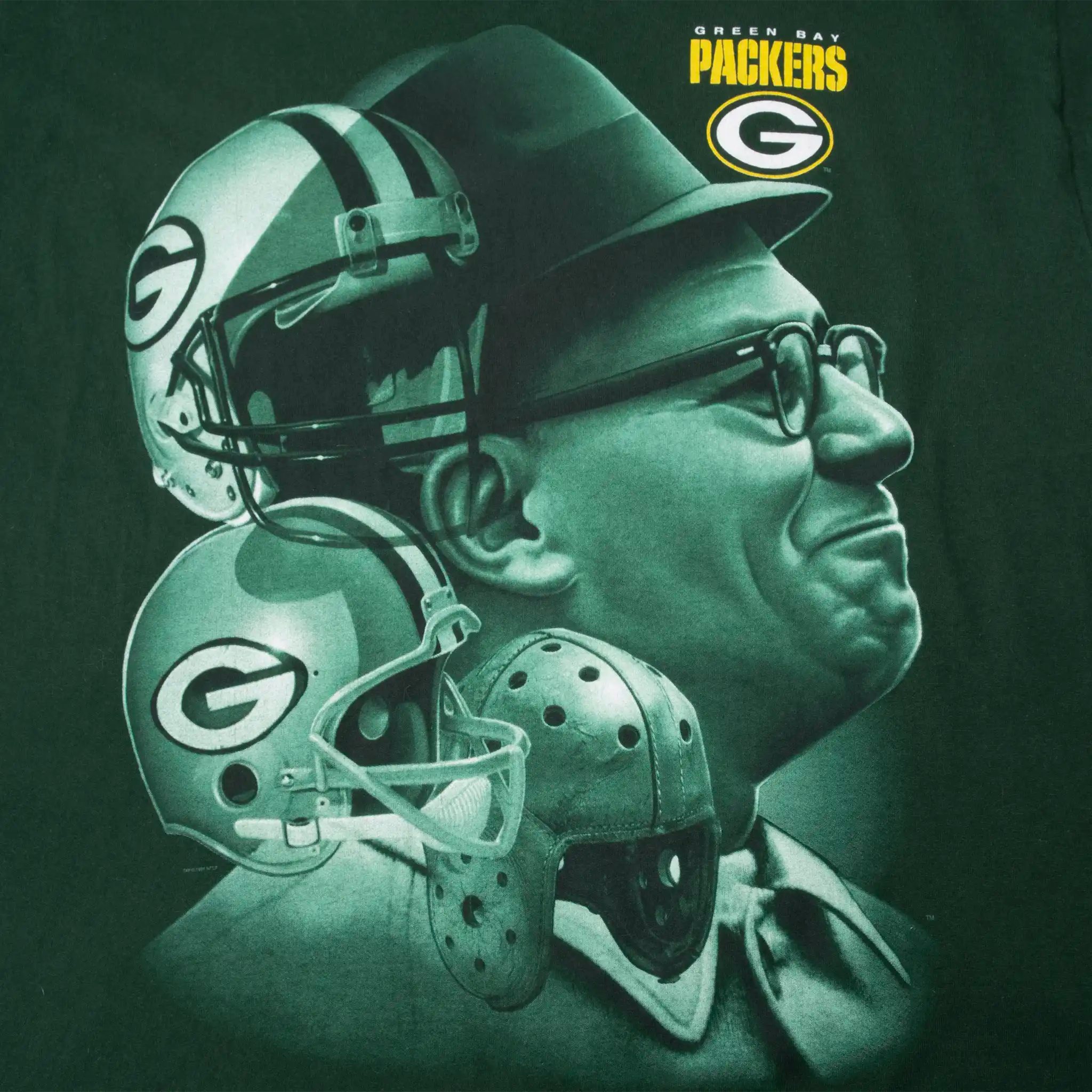 Close-up of Green Bay Packers graphic with coach portrait, helmets and team logo