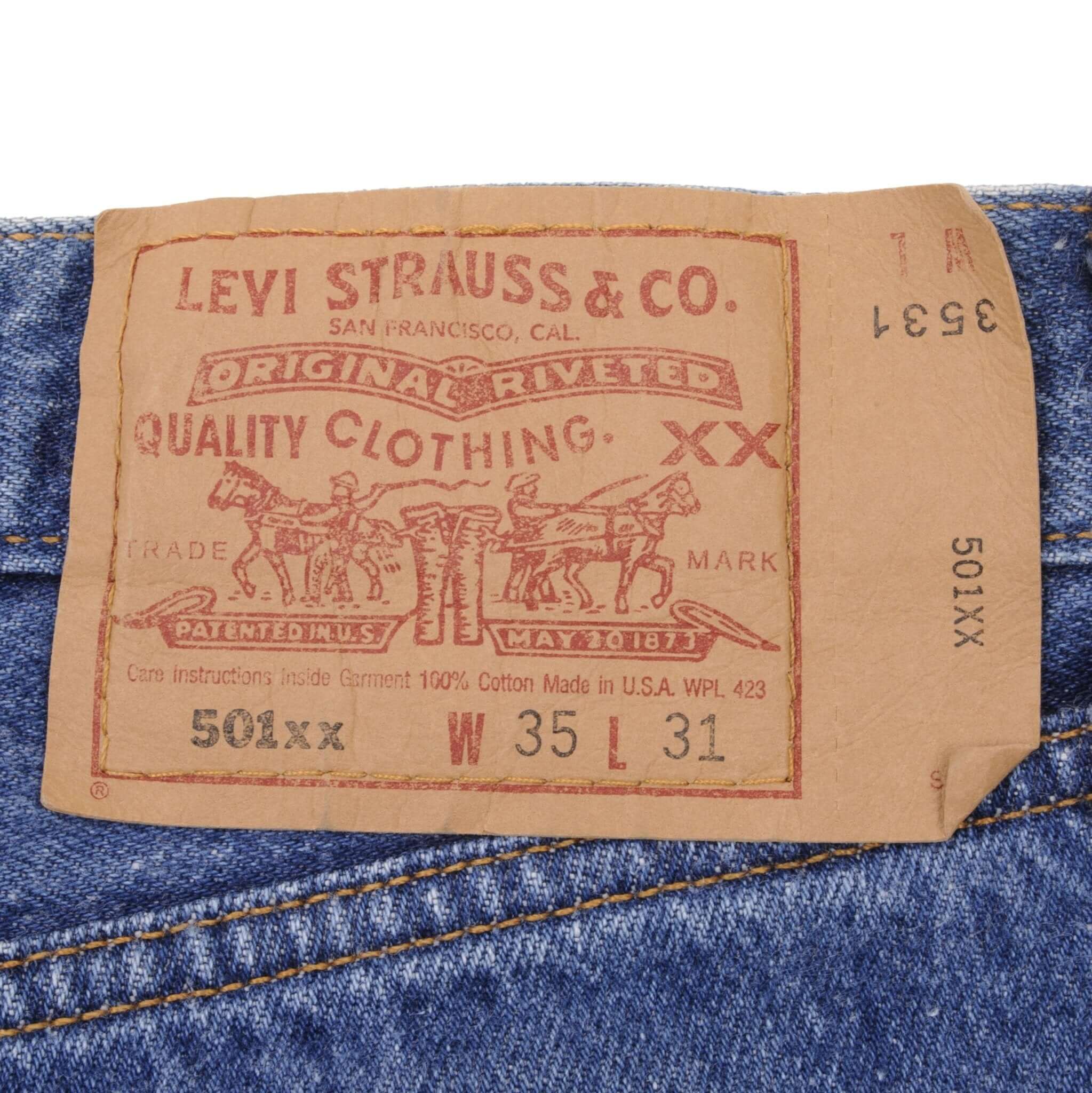 Beautiful Indigo Levis 501 Jeans 1990s Made in USA with Medium Wash Size on tag 35X31 Actual Size 34X29 Back Button #524
