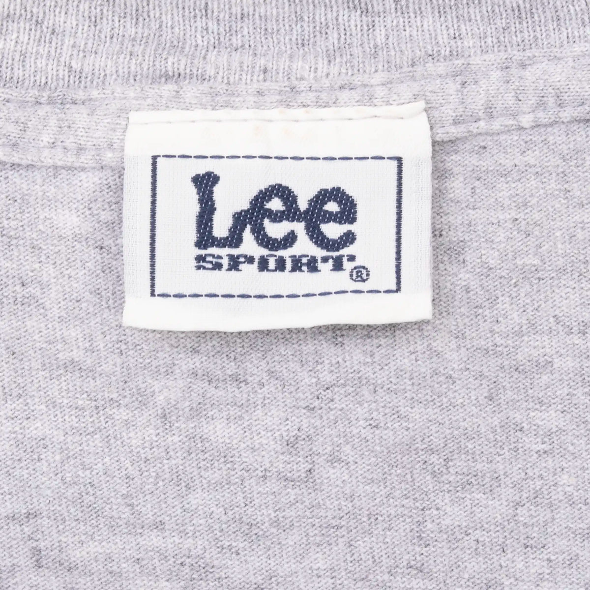 Close-up of Lee Sport neck label on gray T-shirt