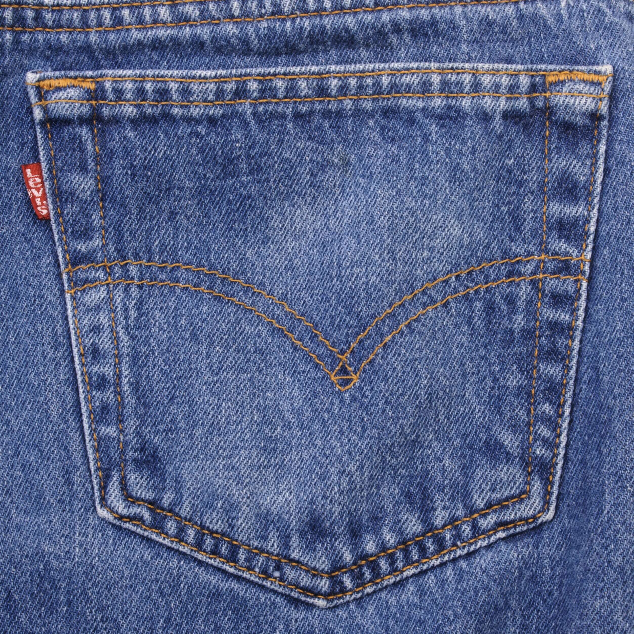 Beautiful Indigo Levis 501 Jeans 1990s Made in USA with Medium Dark Wash Size on tag 35X32 Actual Size 34X29 Back Button #552