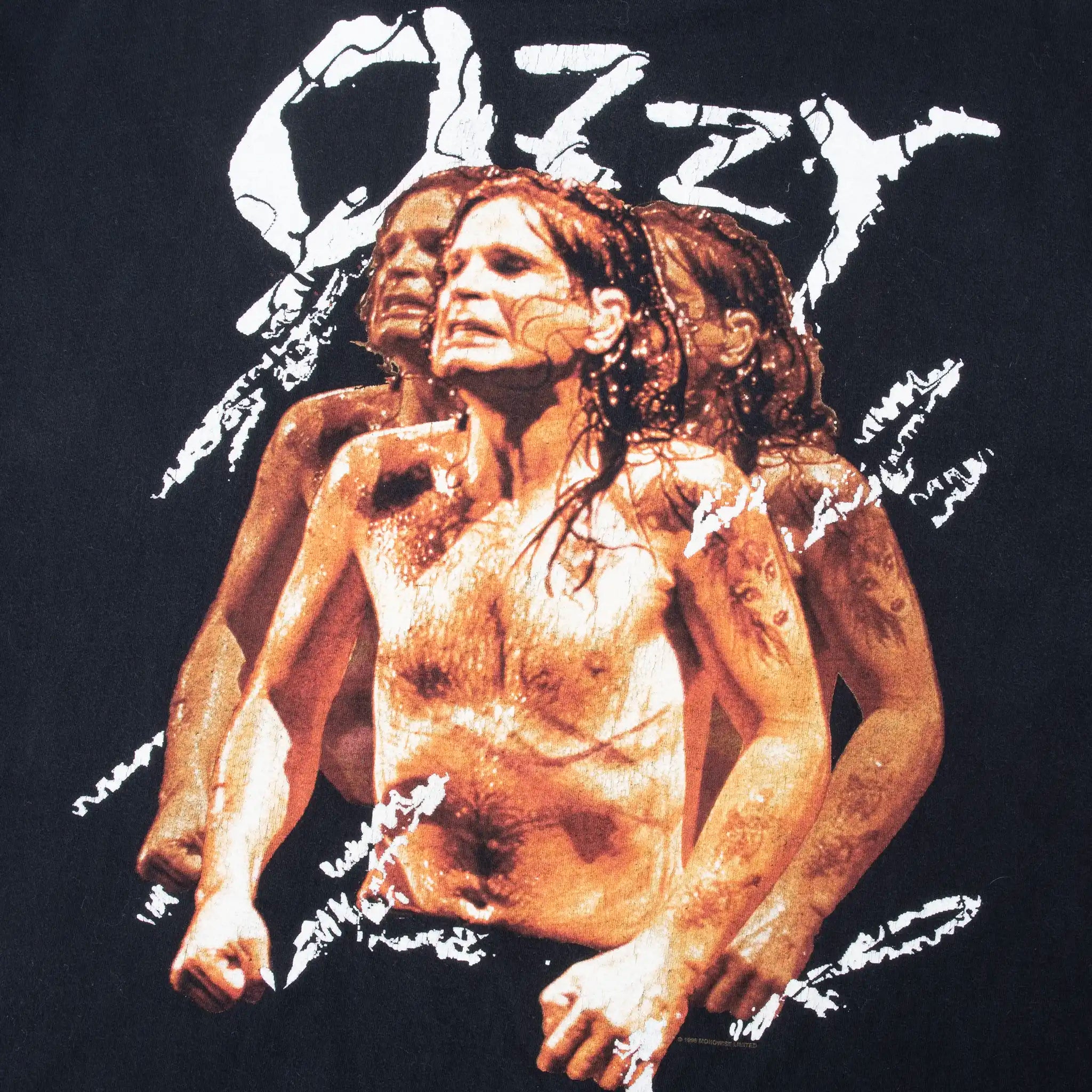 Close-up of layered Ozzy Osbourne portrait graphic on front of black T-shirt