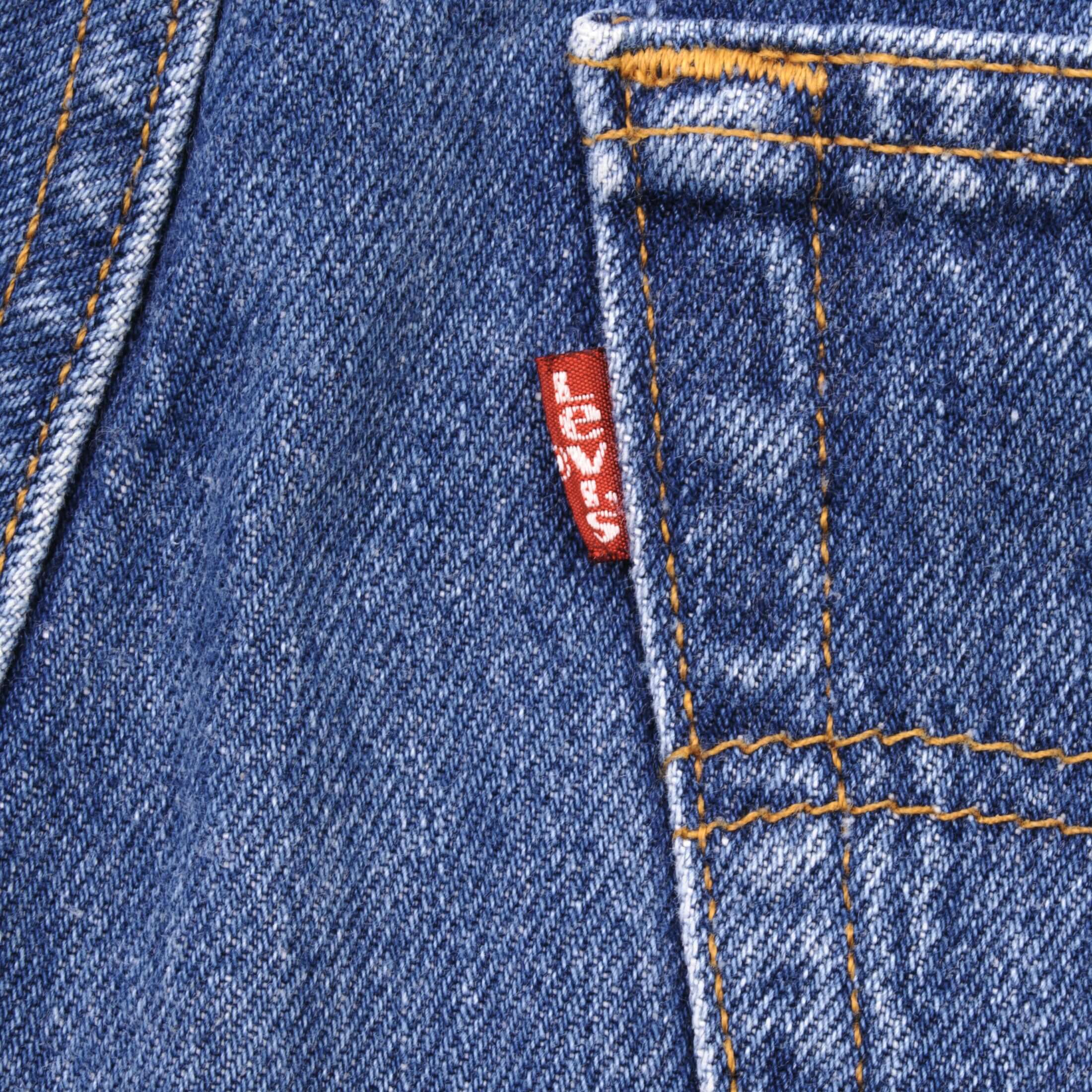 Beautiful Indigo Levis 501 Jeans 1990s Made in USA with Medium Dark Wash Size on tag 35X32 Actual Size 34X29 Back Button #552