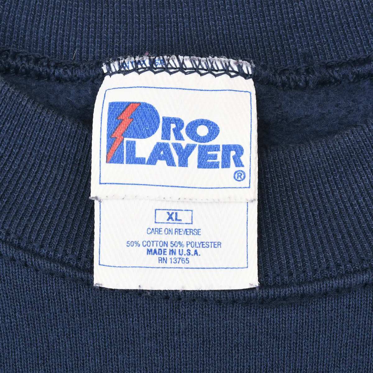 Pro Player neck label marked XL, 50% cotton and 50% polyester, made in USA