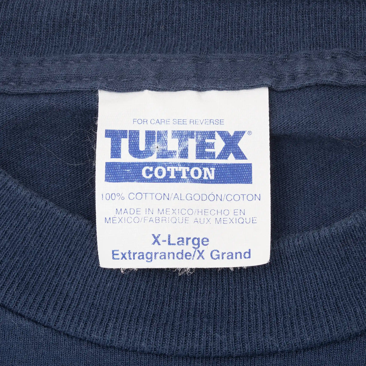 Tultex Cotton X-Large neck tag on navy Seattle Mariners T-shirt