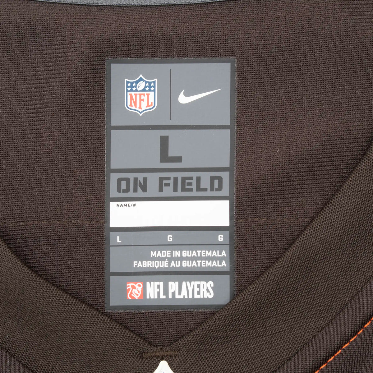 Interior Nike NFL On Field size large neck label on brown Cleveland Browns jersey