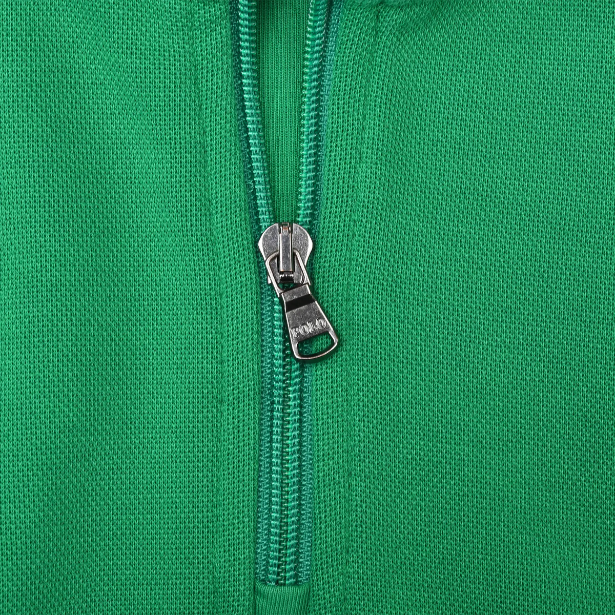 Close-up of metal quarter-zip closure on green Polo Ralph Lauren sweater