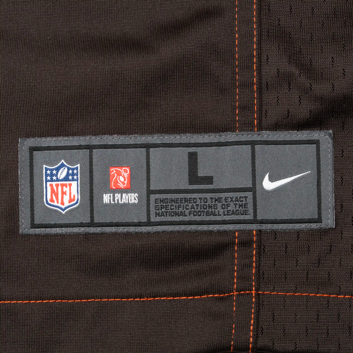 Nike NFL size large hem label with NFL Players logo on brown Cleveland Browns jersey