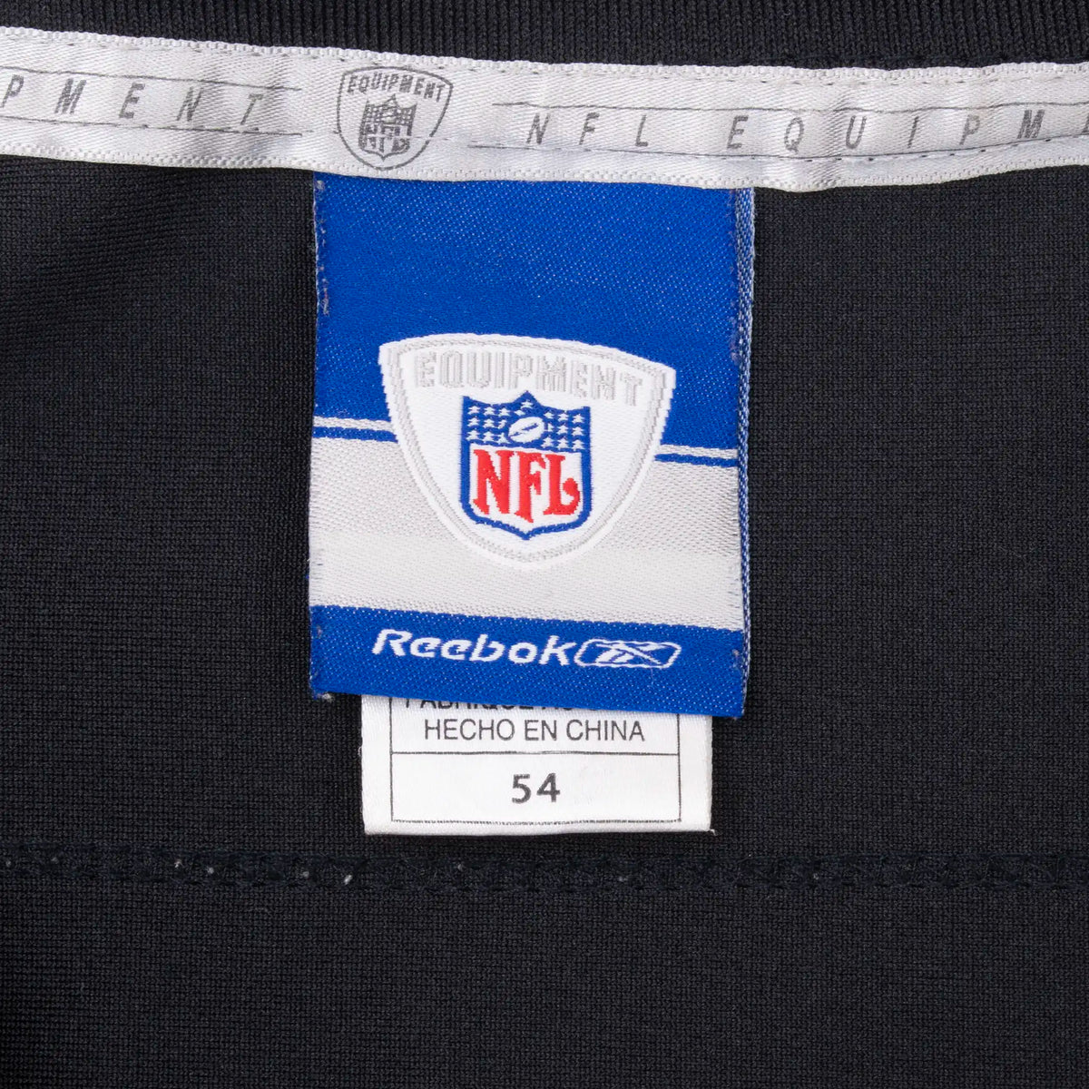 Reebok NFL Equipment neck label and size 54 tag inside jersey