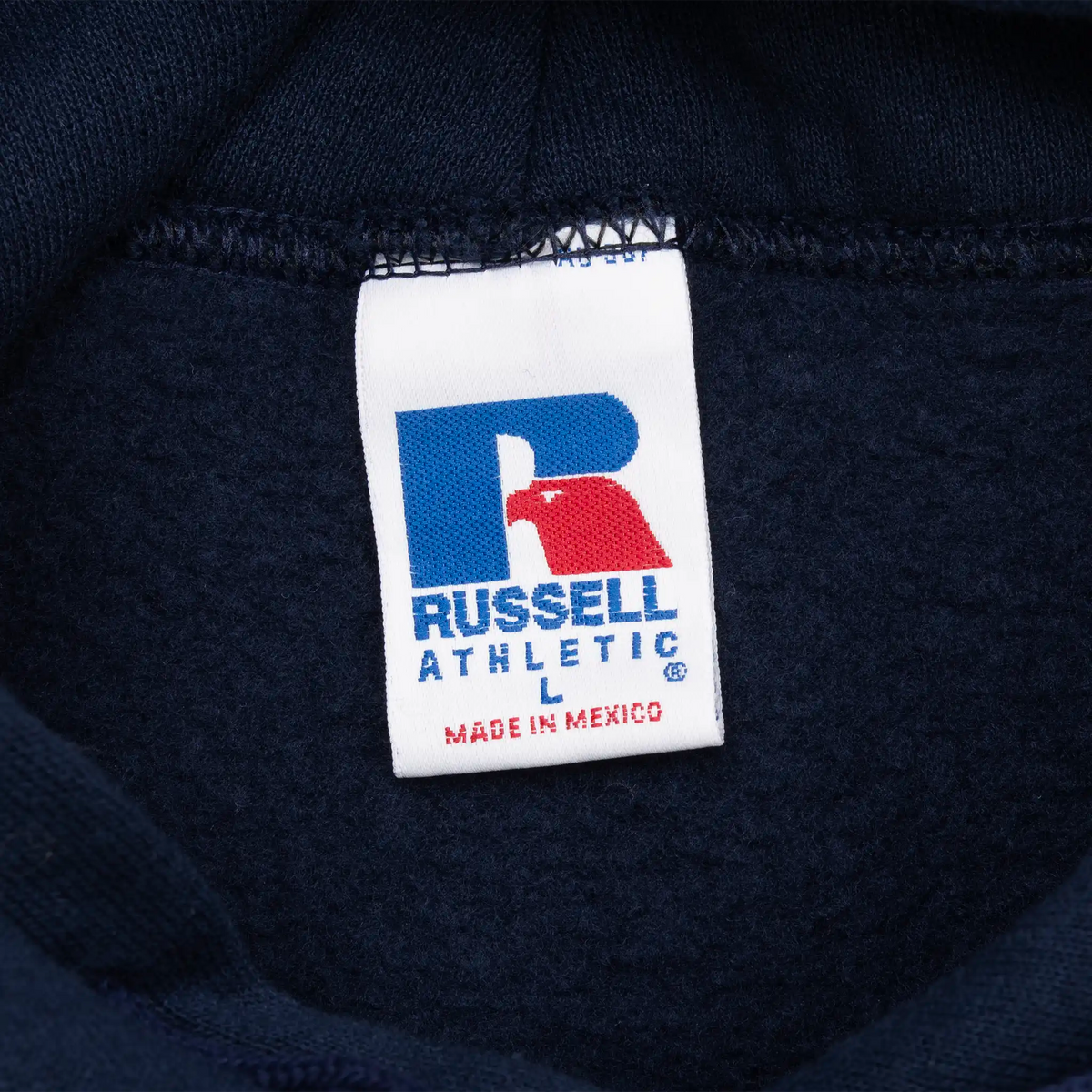 Russell Athletic size large neck tag inside navy blue hoodie