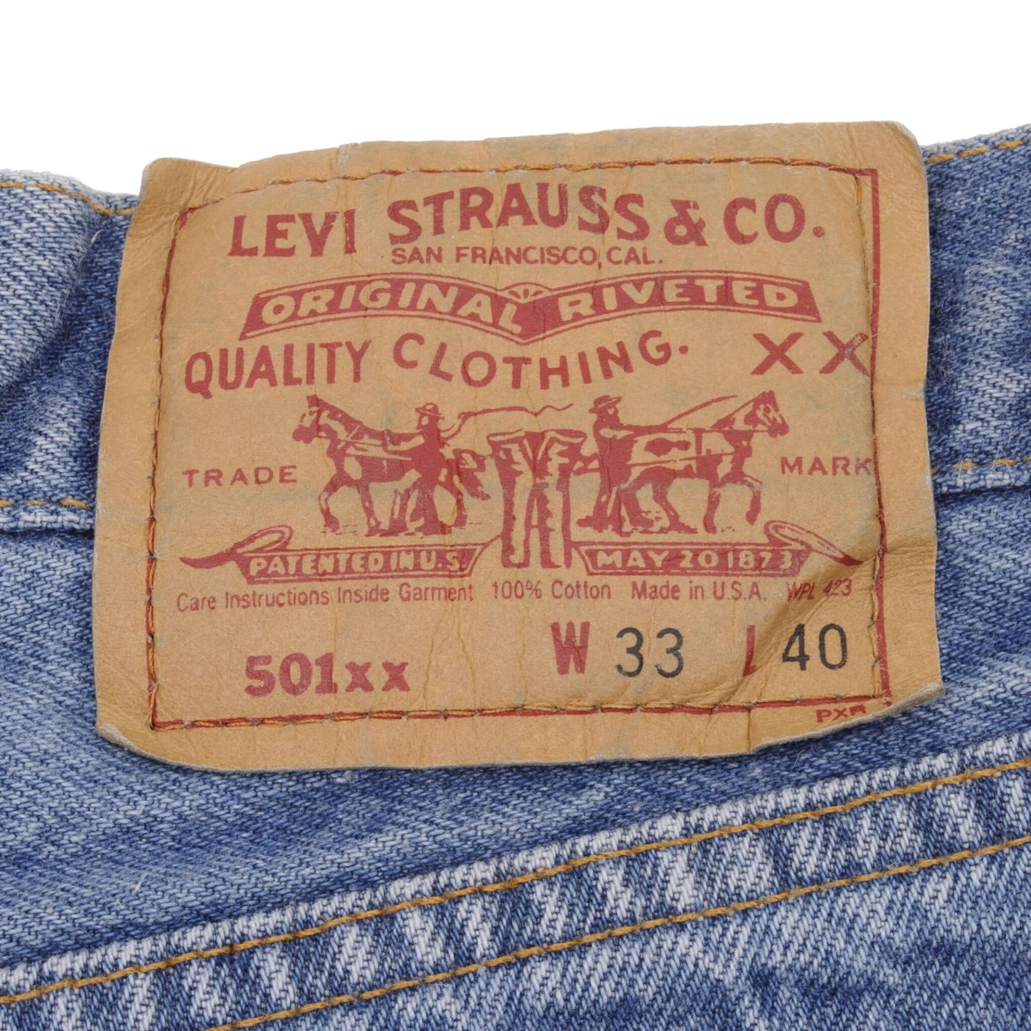 Beautiful Indigo Levis 501 Jeans 1980s Made in USA with Medium Wash Size on tag 33X40 Actual Size 31X36 Back Button #552